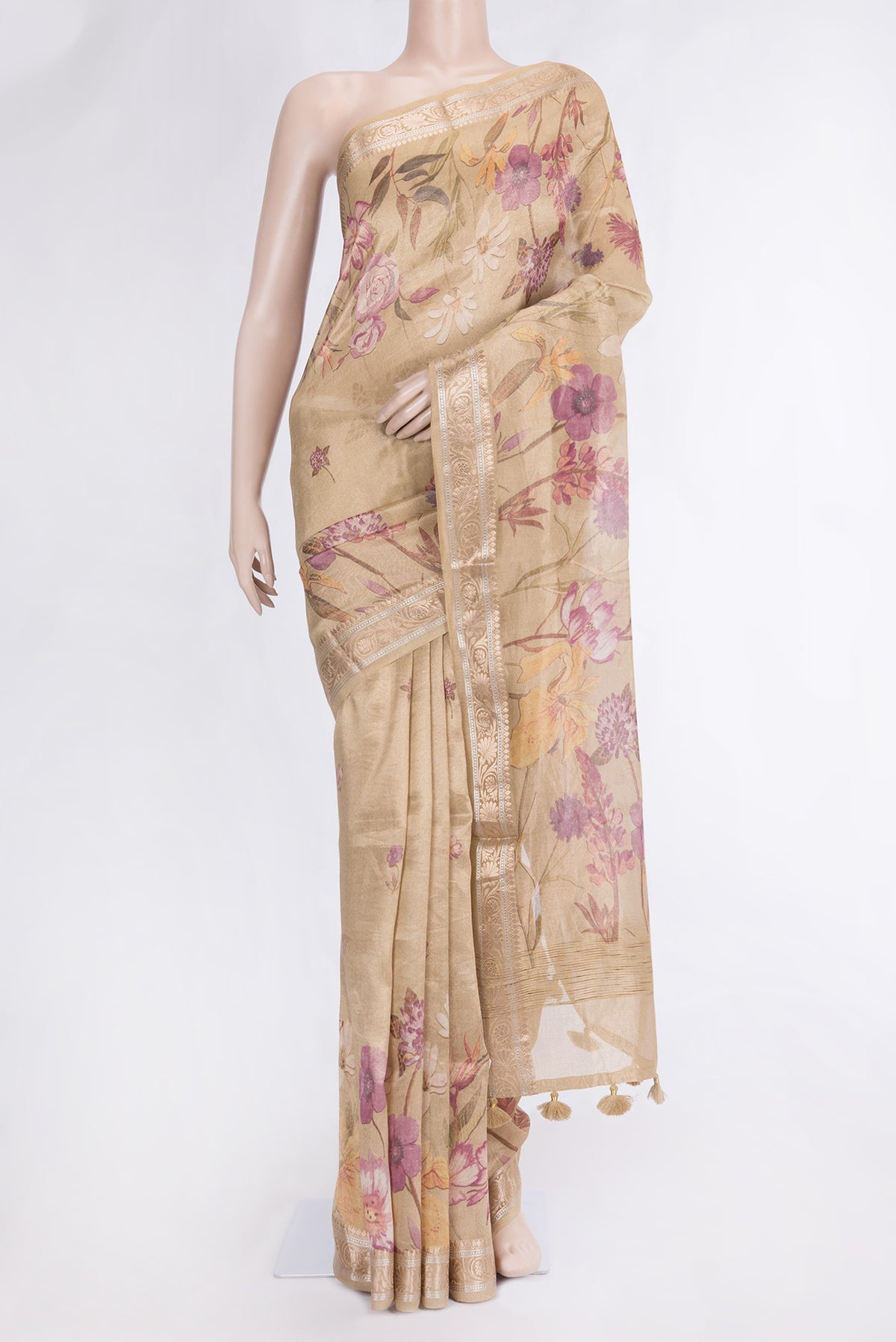 Beige Dual Tone Organza Silk Saree with Printed design on the body and Zari Border.  displayed on a mannequin
