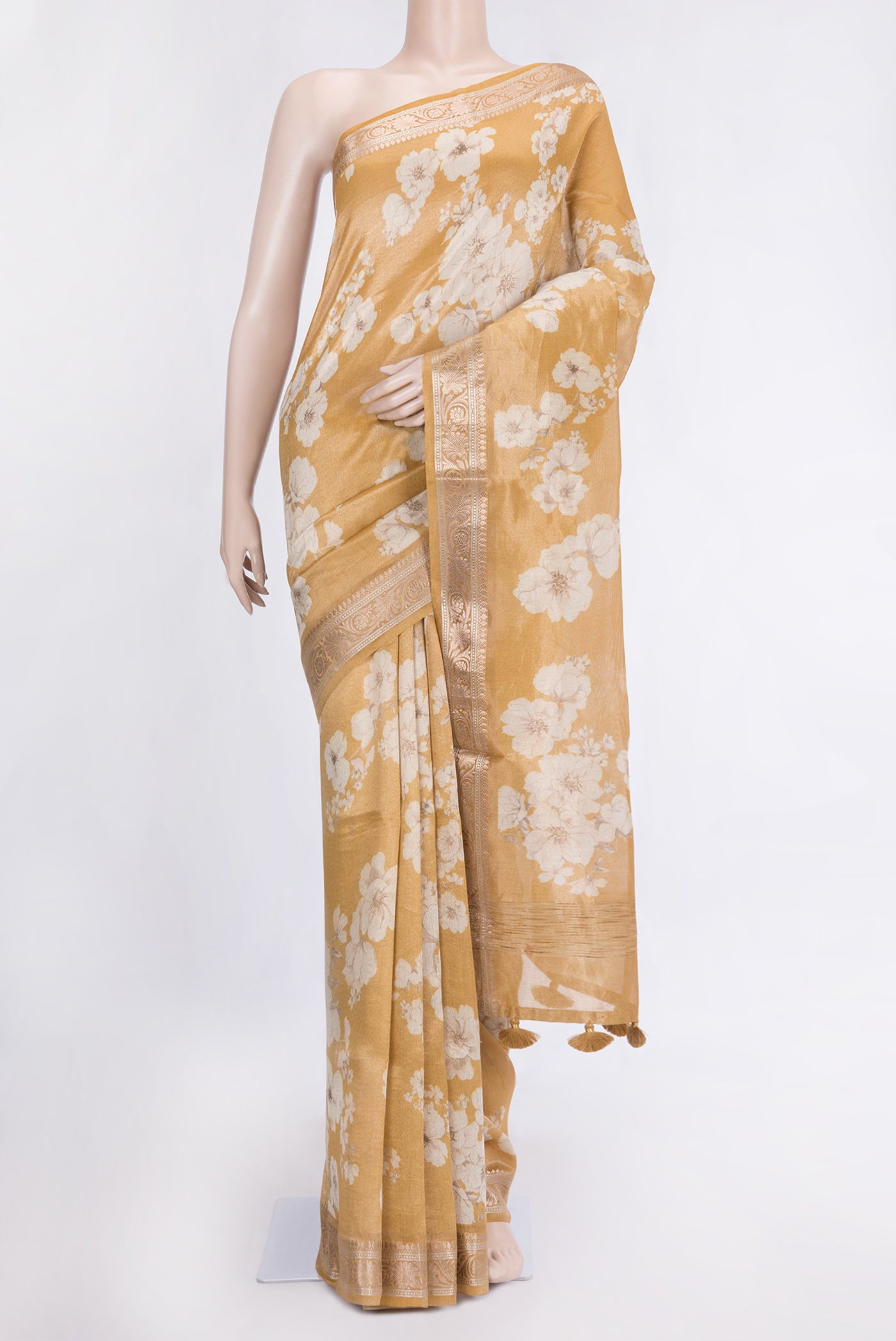 Mustard Dual Tone Organza Silk Saree with Printed design on the body and Zari Border.  displayed on a mannequin