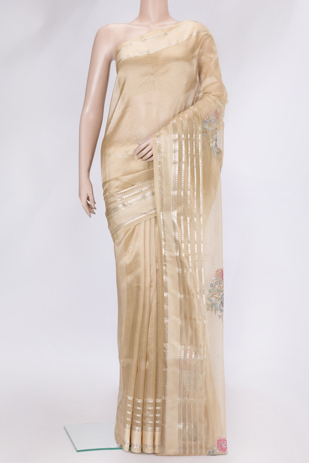 Gold Dual Tone Organza Silk Saree with Embroidery on the body and Zari Border.  displayed on a mannequin