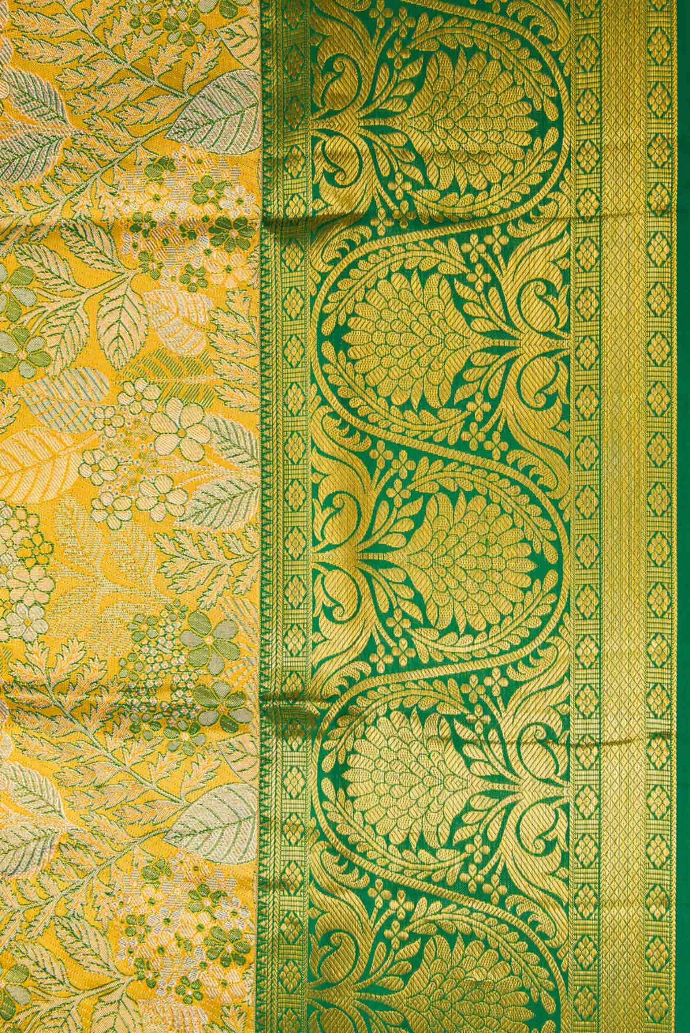 Border image of Gold Dual Tone Kanchipuram Tissue Silk Saree with Zari Brocade on the body and Zari Border. 