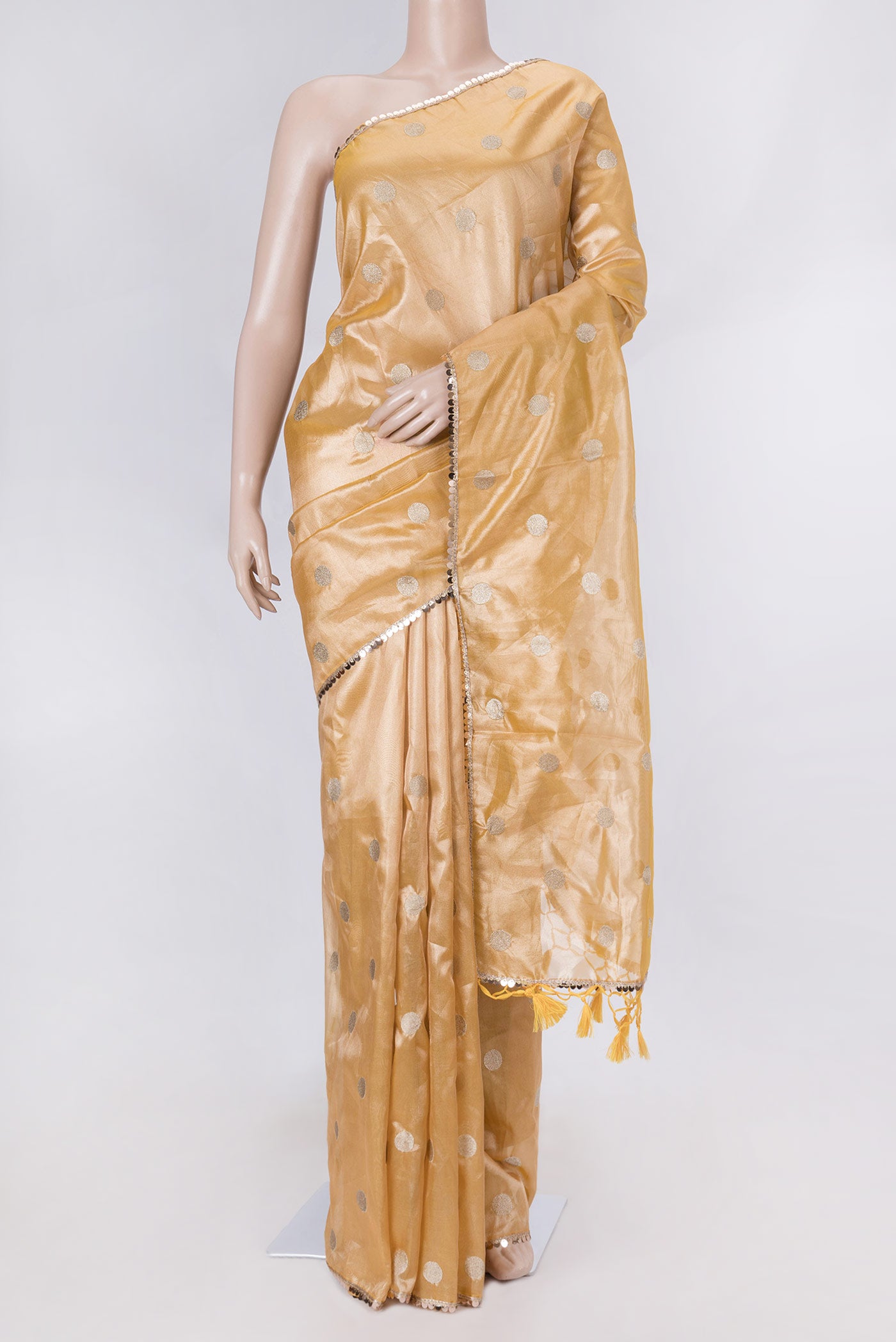 Gold Dual Tone Blended Organza Silk Saree with Zari Brocade on the body and Embroidery Border displayed on a mannequin