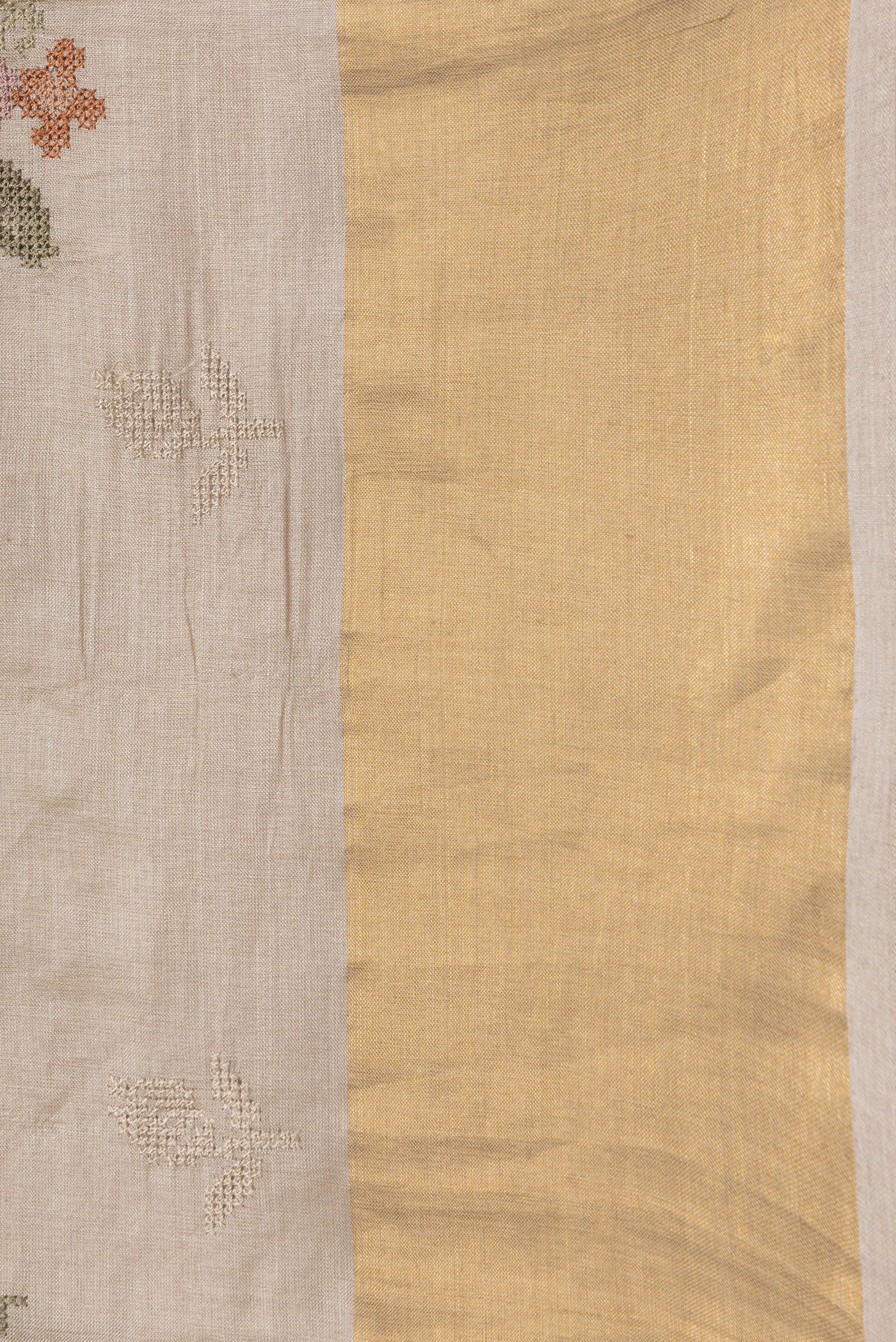 Border image of Beige Dual Tone Tussar Silk Saree with Embroidery on the body and Zari Border. 