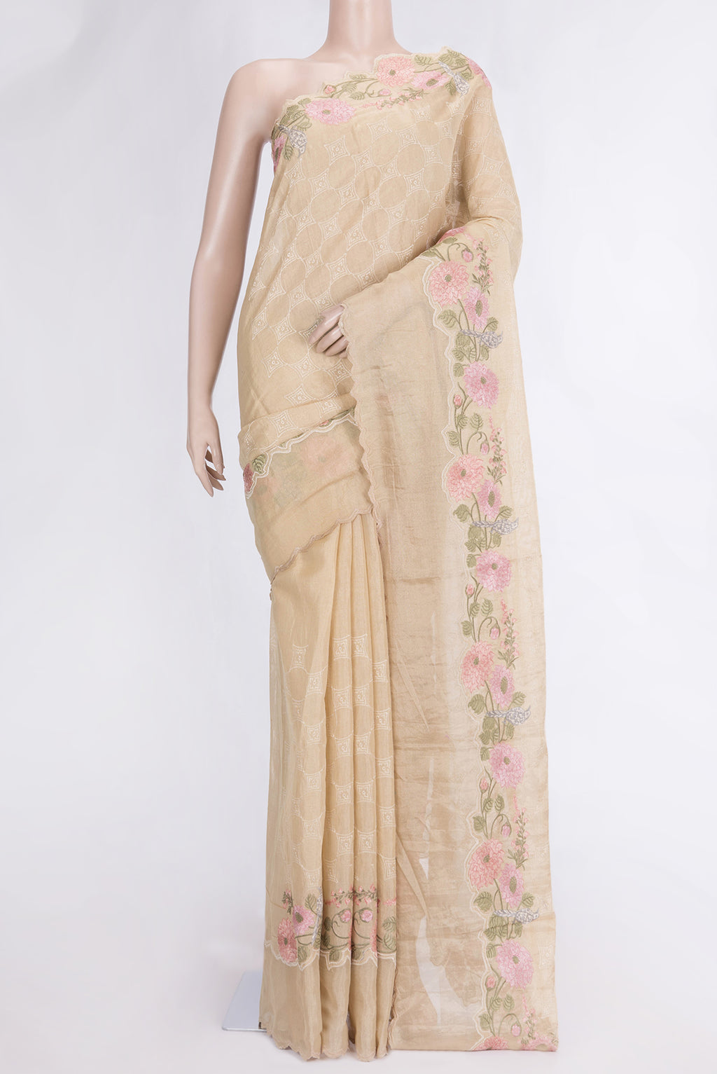 Beige Dual Tone Organza Silk Saree with Embroidery on the body and Embroidery Border.  displayed on a mannequin