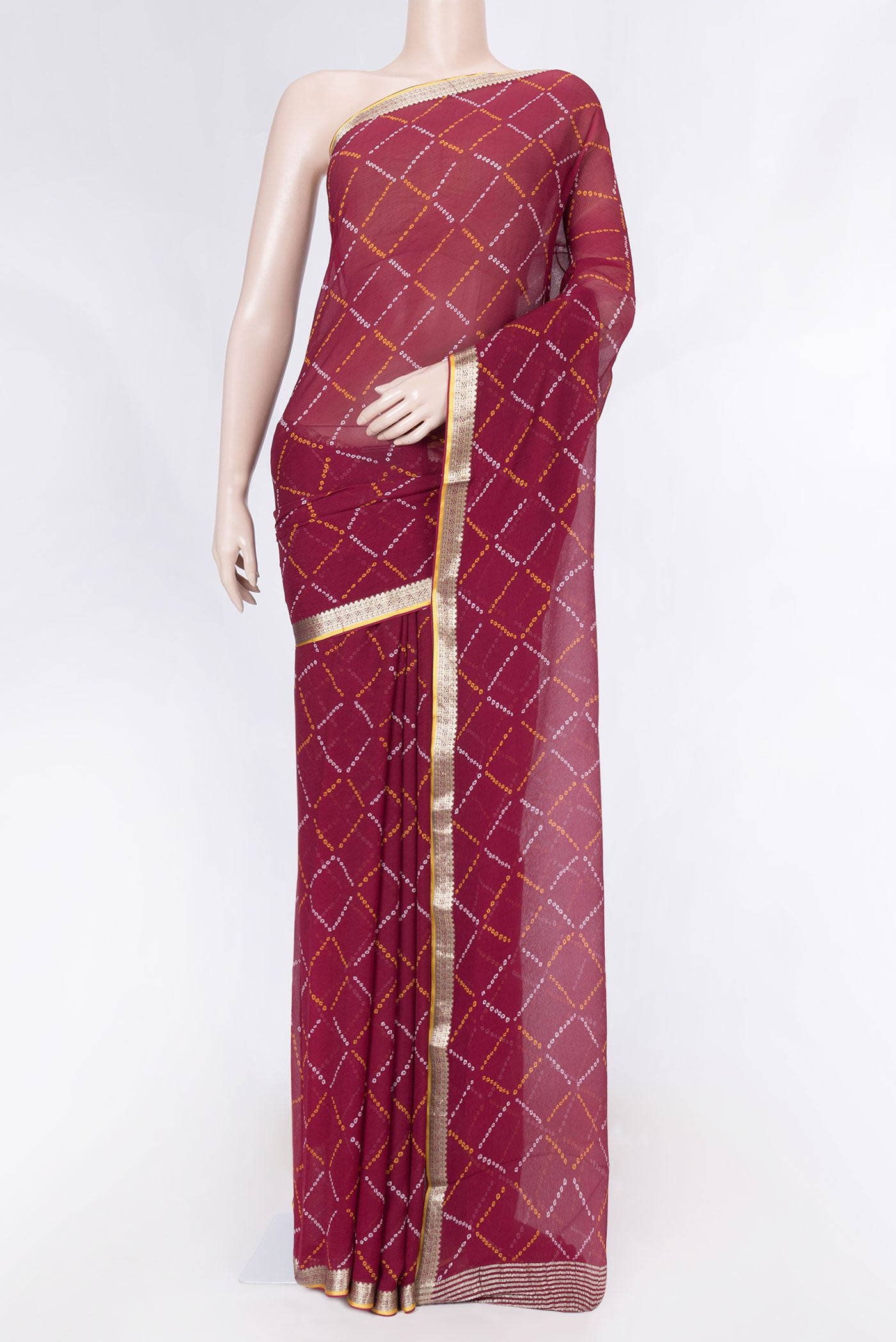 Maroon Dual Tone Mysore Chiffon Saree with Printed design on the body and Zari Border displayed on a mannequin