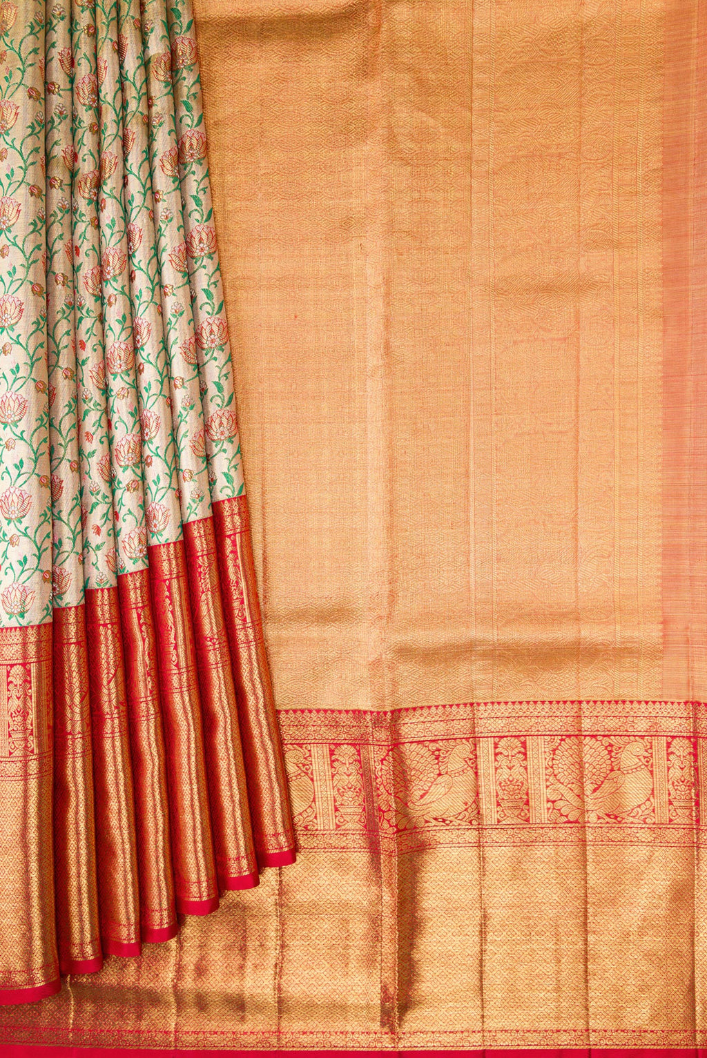 Pleats and pallu of Gold Dual Tone Kanjivaram Tissue Silk Saree with Zari Brocade on the body and Zari Border. 