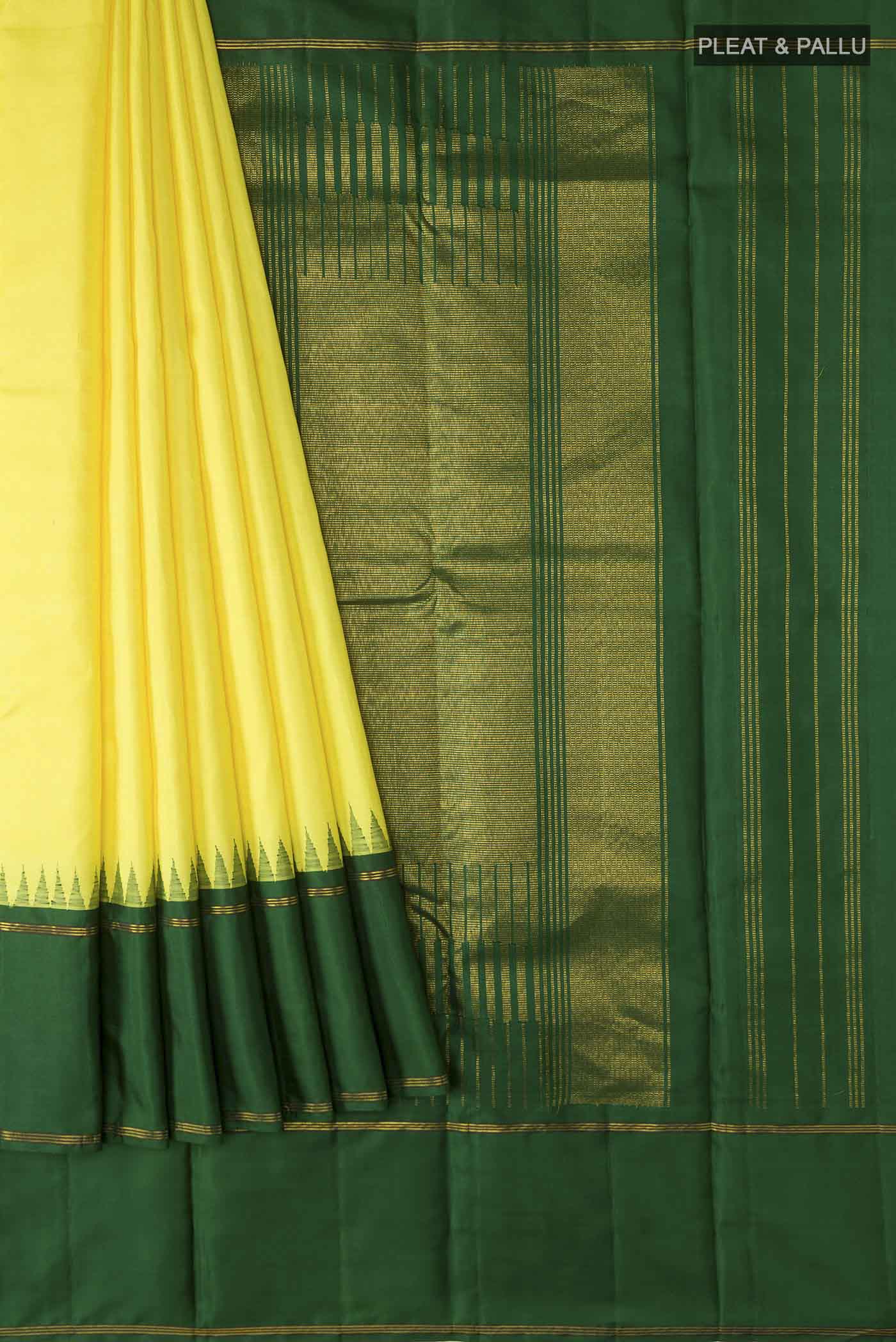 Pleats and pallu of Yellow Kanchipuram Silk Saree with Plain Body and Zari Border