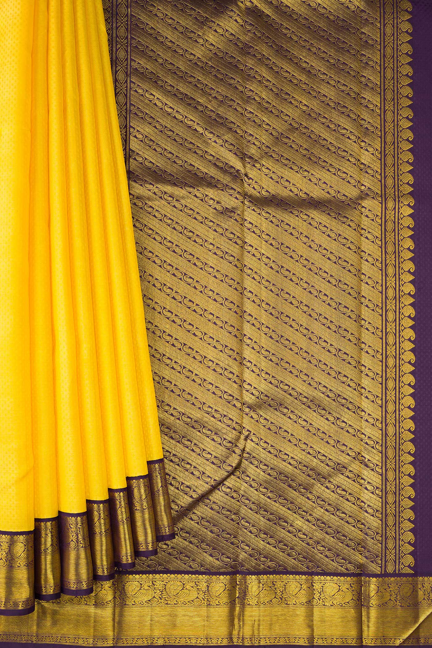 Pleats and pallu of Yellow Dual Tone Kanjivaram Silk Saree with Jacquard design on the body and Zari Border. 