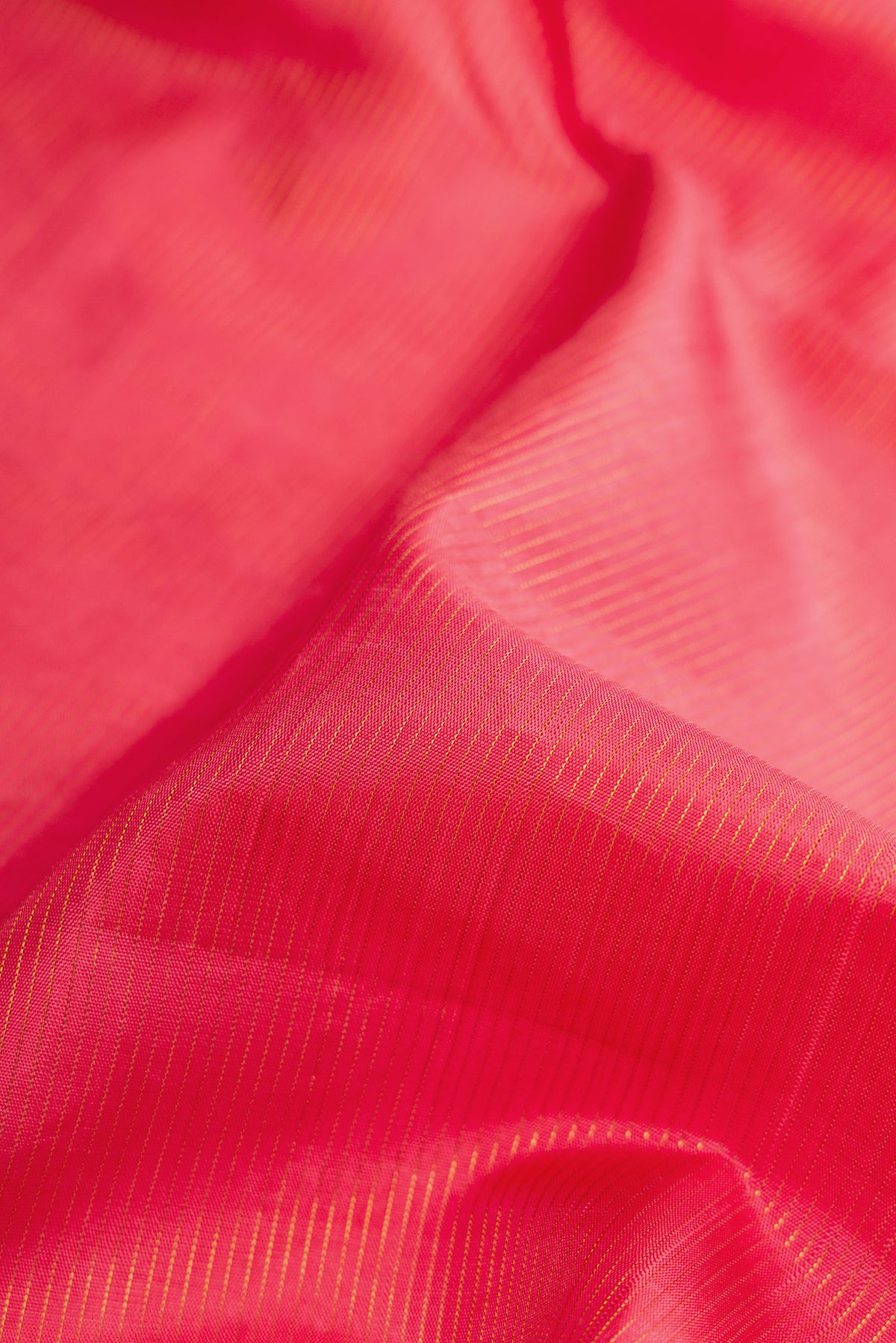 Close up of Pure Silk Pure Zari Pink Dual Tone Kanchipuram Nine Yards Saree with Stripes on the body and Zari Border.  displaying folds