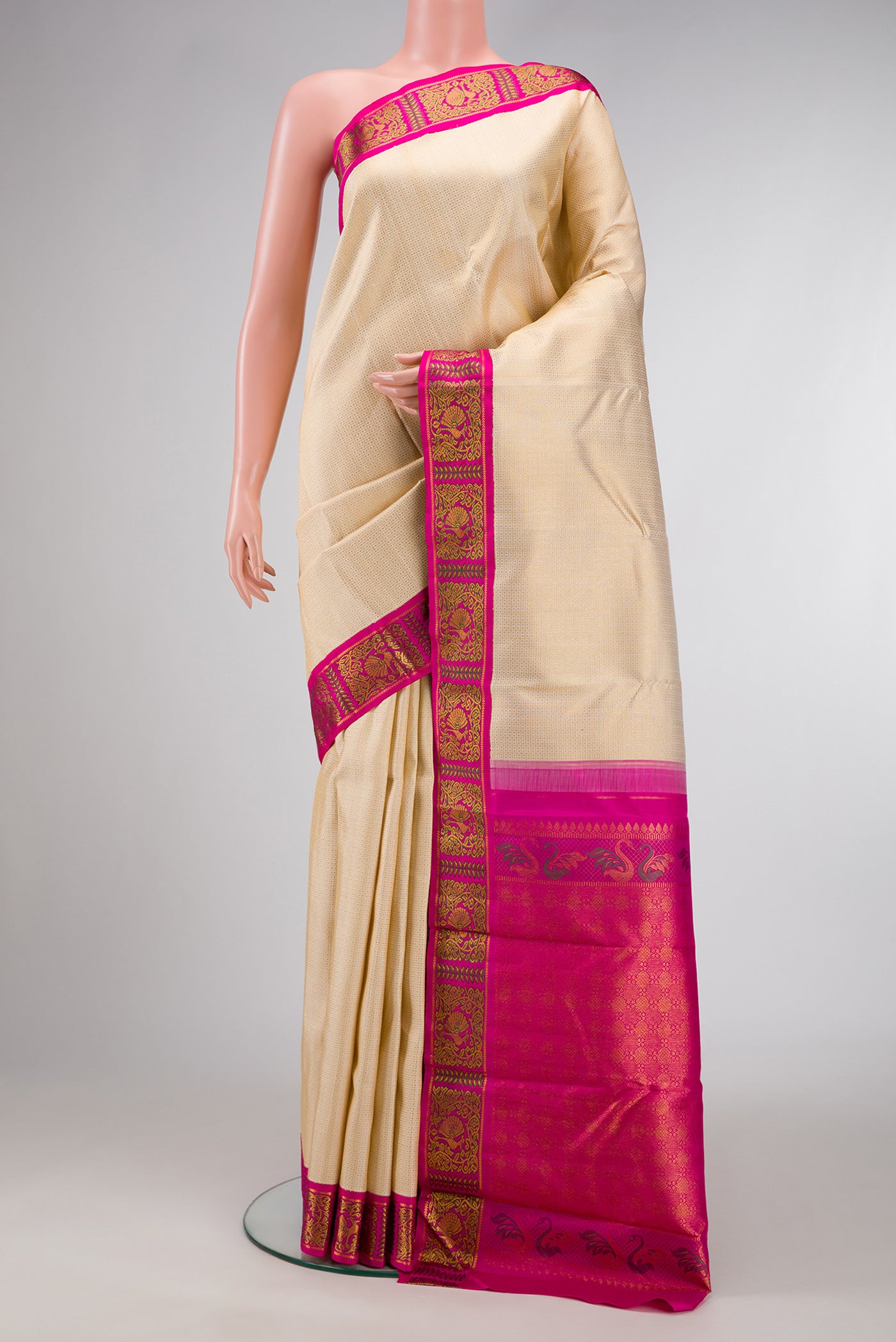 Sandal Dual Tone Kanchipuram Silk Saree with Zari Brocade on the body and Fancy Border.  displayed on a mannequin