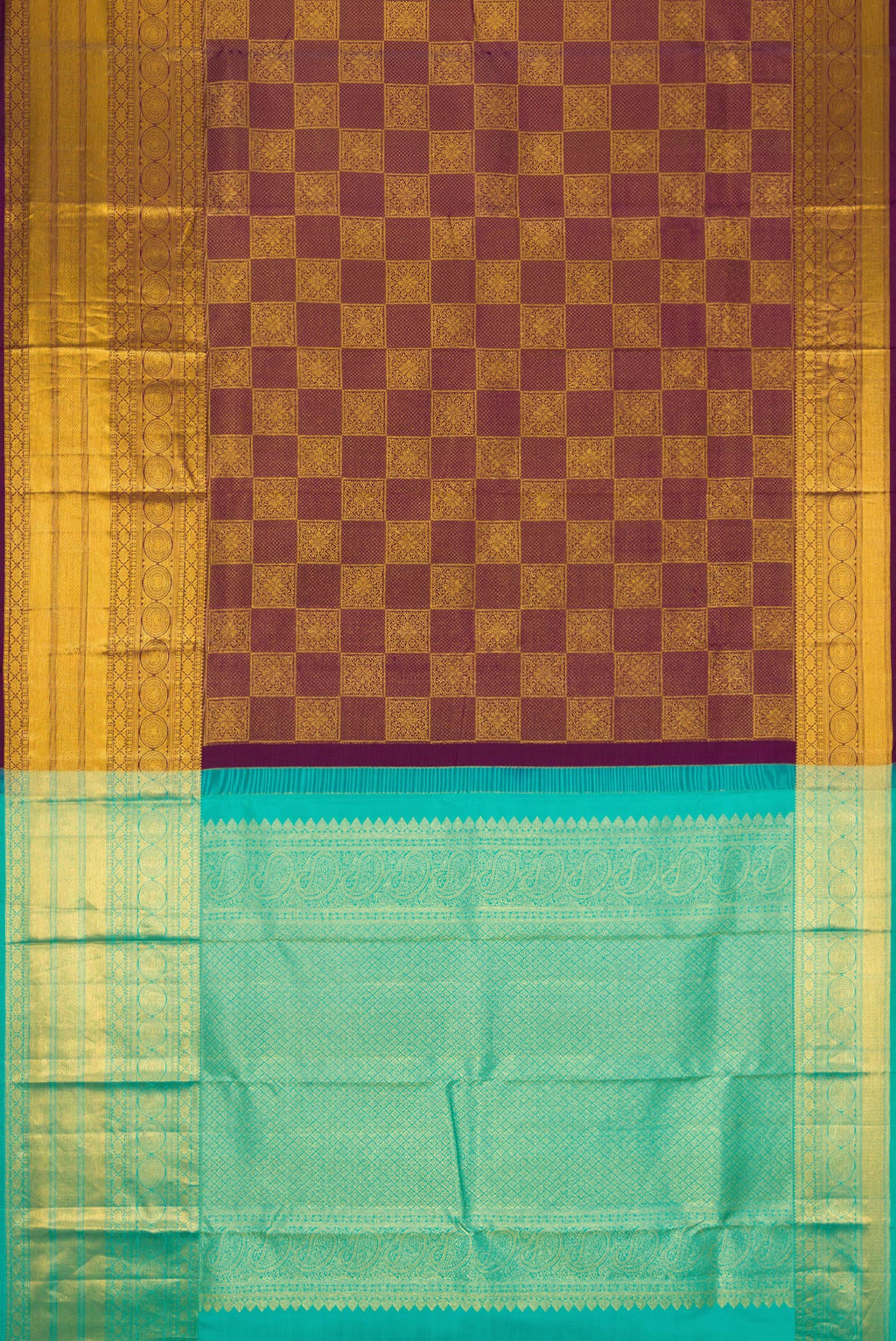 Flat view of Brown Dual Tone Kanjivaram Silk Saree with Zari Brocade on the body and Zari Border. 