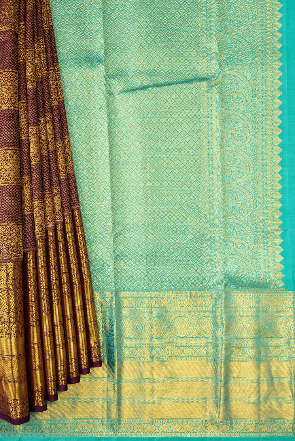 Pleats and pallu of Brown Dual Tone Kanjivaram Silk Saree with Zari Brocade on the body and Zari Border. 