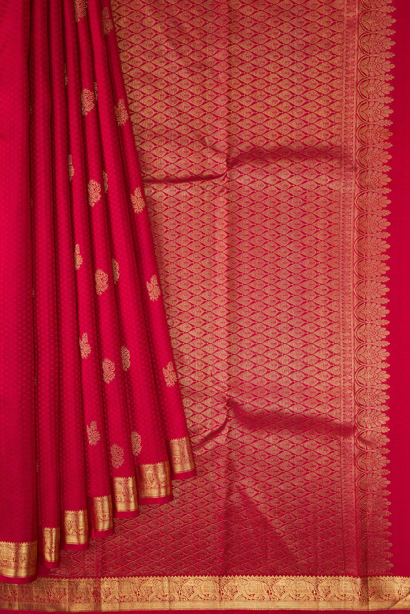 Pleats and pallu of Pure Silk Pure Zari Red Dual Tone Kanjivaram Saree with Jacquard design on the body and Zari Border. 