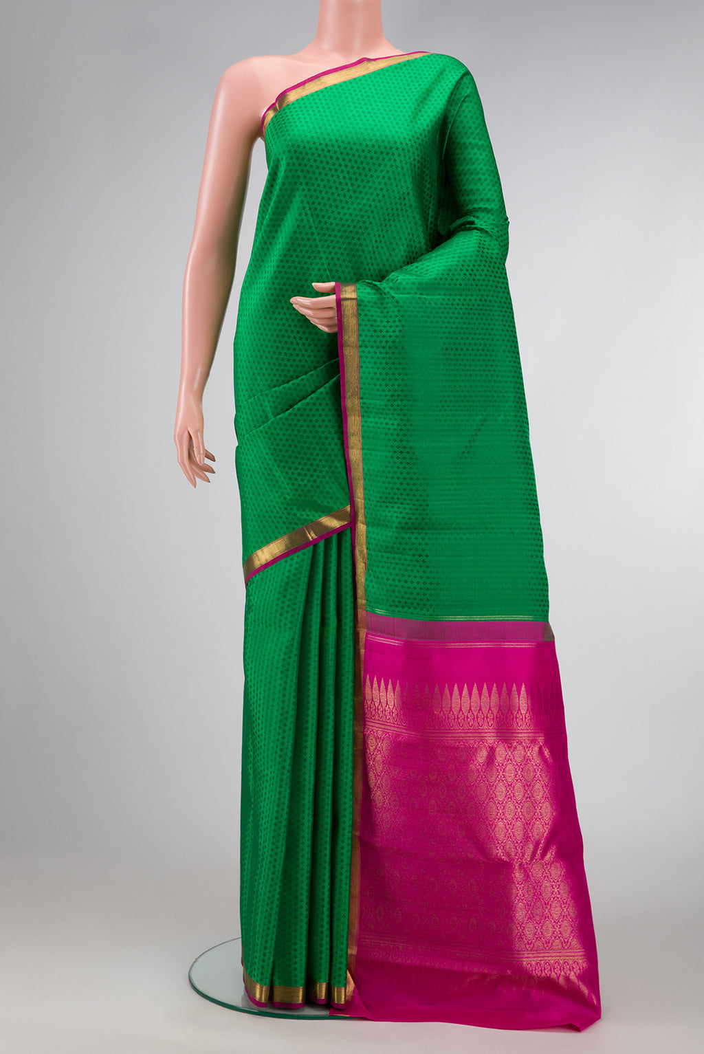 Green Dual Tone Kanchipuram Silk Saree with Jacquard design on the body and Zari Border.  displayed on a mannequin