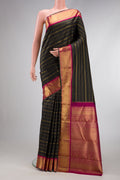 Pure Silk Pure Zari Black Dual Tone Kanjivaram Saree with Stripes on the body and Zari Border.  displayed on a mannequin