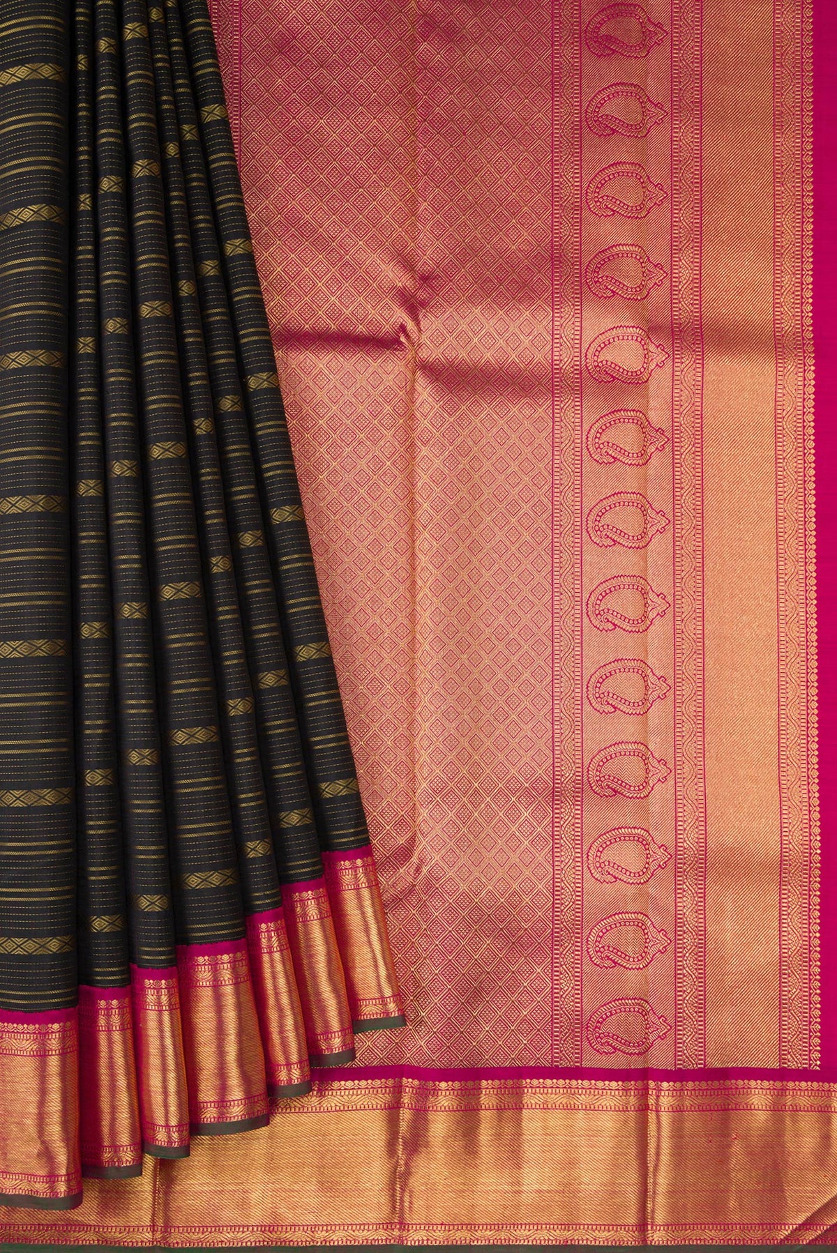 Pleats and pallu of Pure Silk Pure Zari Black Dual Tone Kanjivaram Saree with Stripes on the body and Zari Border. 