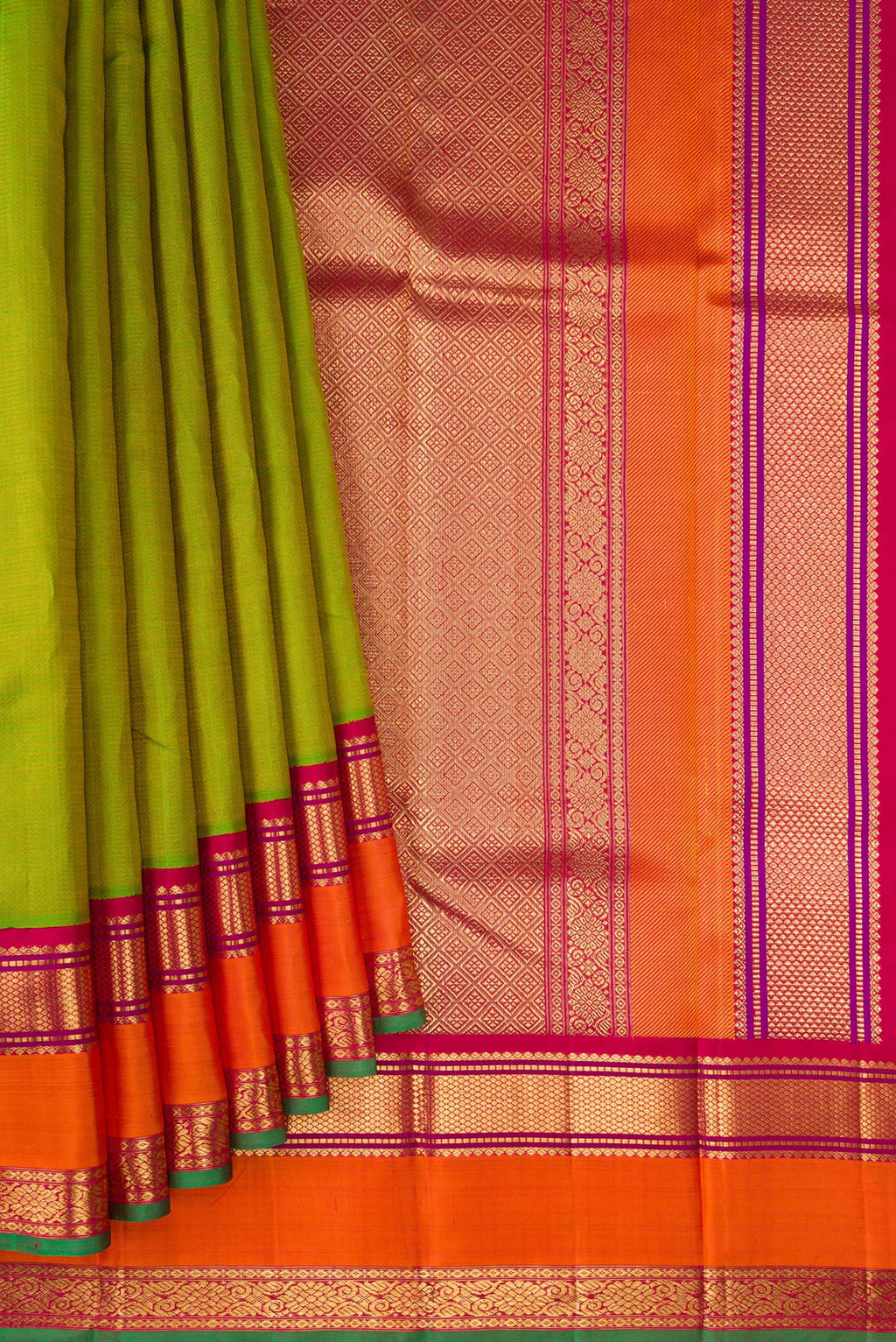 Pleats and pallu of Pure Silk Pure Zari Parrot Green Kanjivaram Saree with Stripes on the body and Zari Border. 