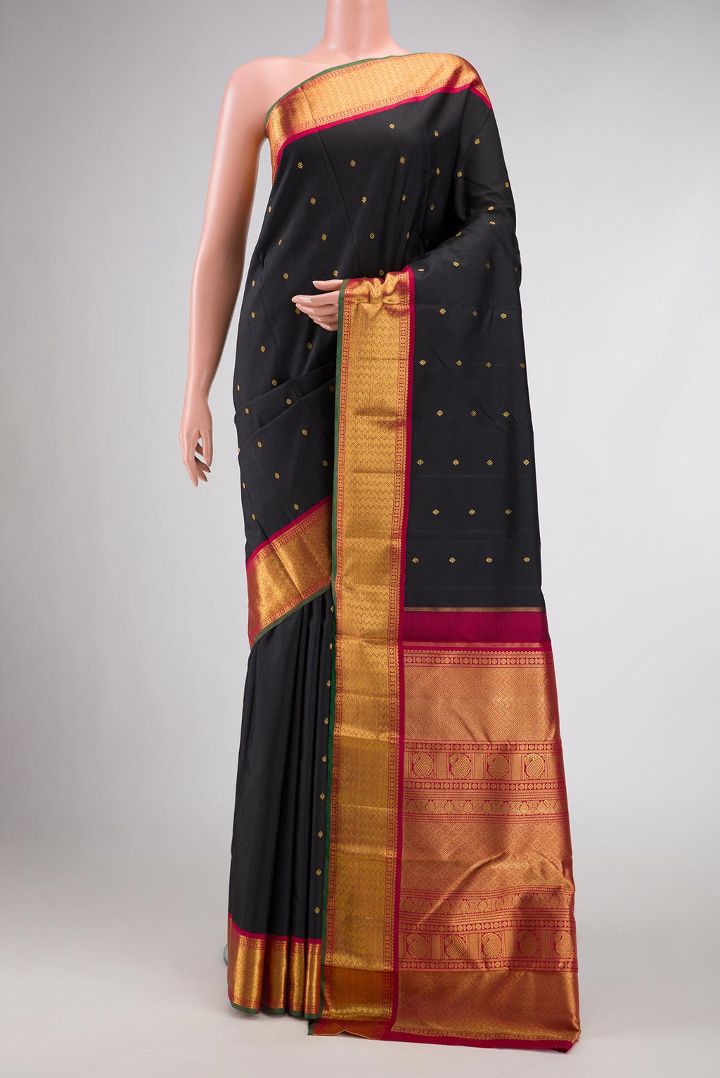 Pure Silk Pure Zari Black Dual Tone Kanchipuram Saree with Zari Butta on the body and Zari Border displayed on a mannequin