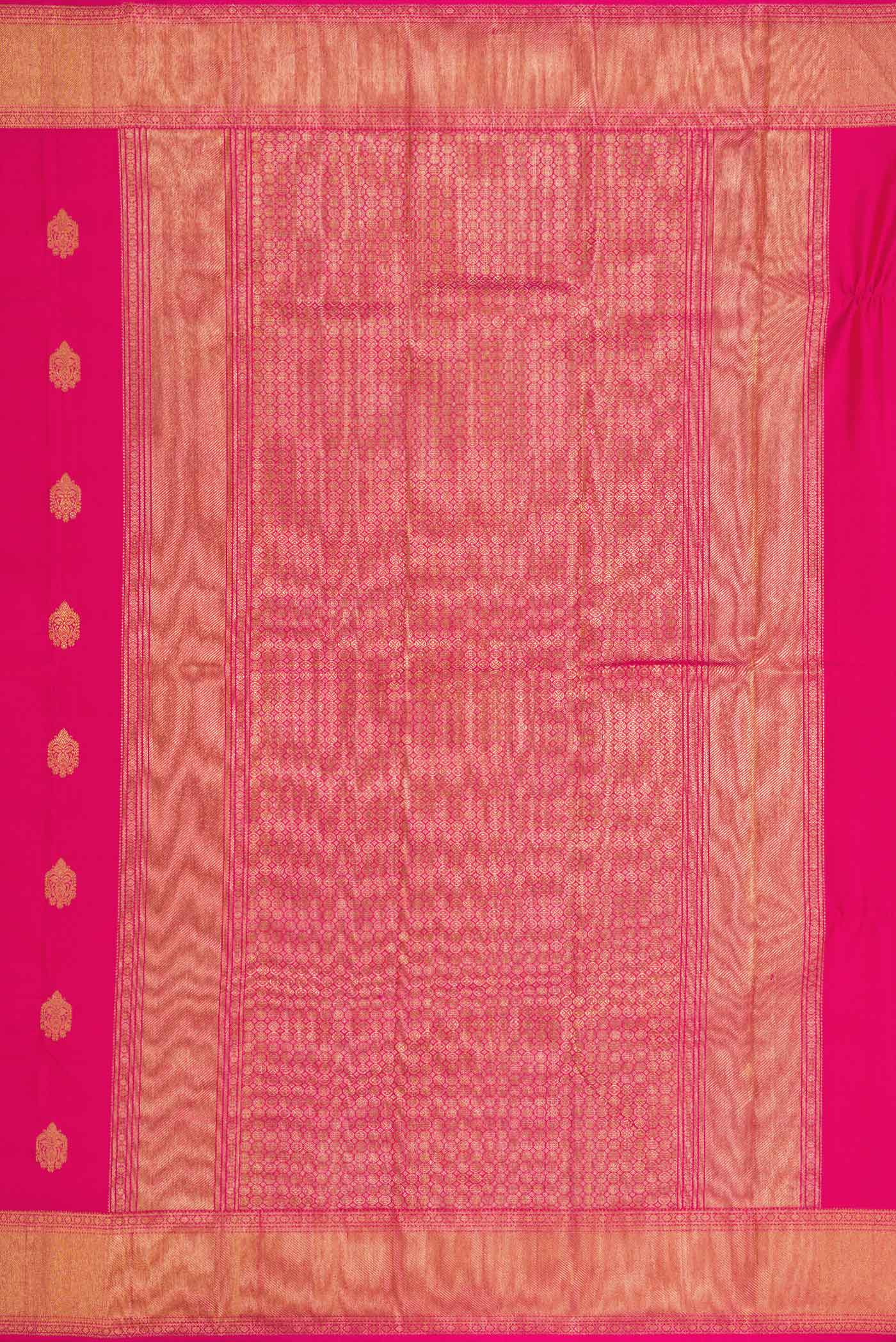 Close up image of the pallu of Pure Silk Pure Zari Dark Pink Dual Tone Kanchipuram Saree with Zari Butta on the body and Zari Border