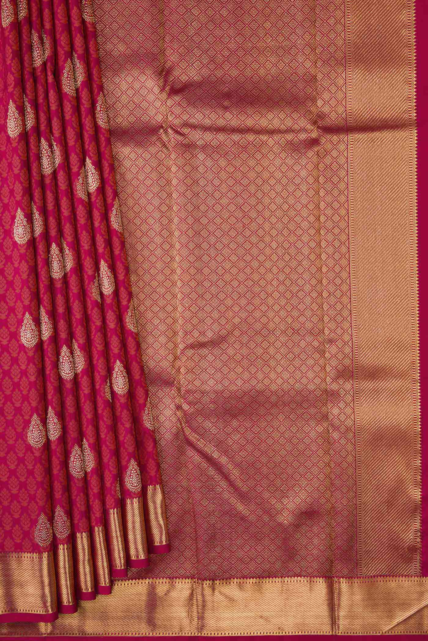 Pleats and pallu of Pure Silk Pure Zari Maroon Dual Tone Kanchipuram Saree with Jacquard With Zari Butta on the body and Zari Border. 