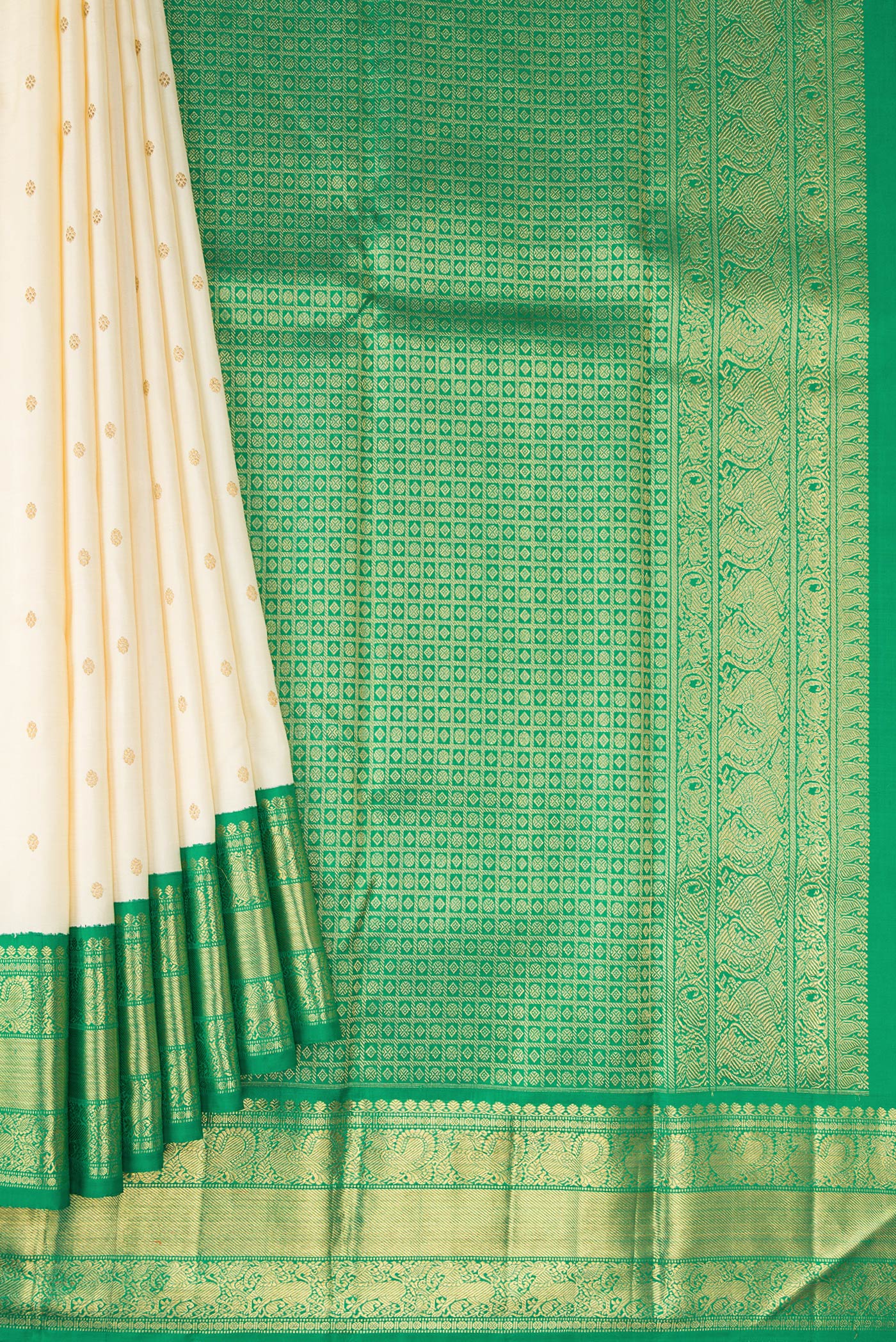 Pleats and pallu of Pure Silk Pure Zari Off White Kanjivaram Saree with Zari Butta on the body and Zari Border. 