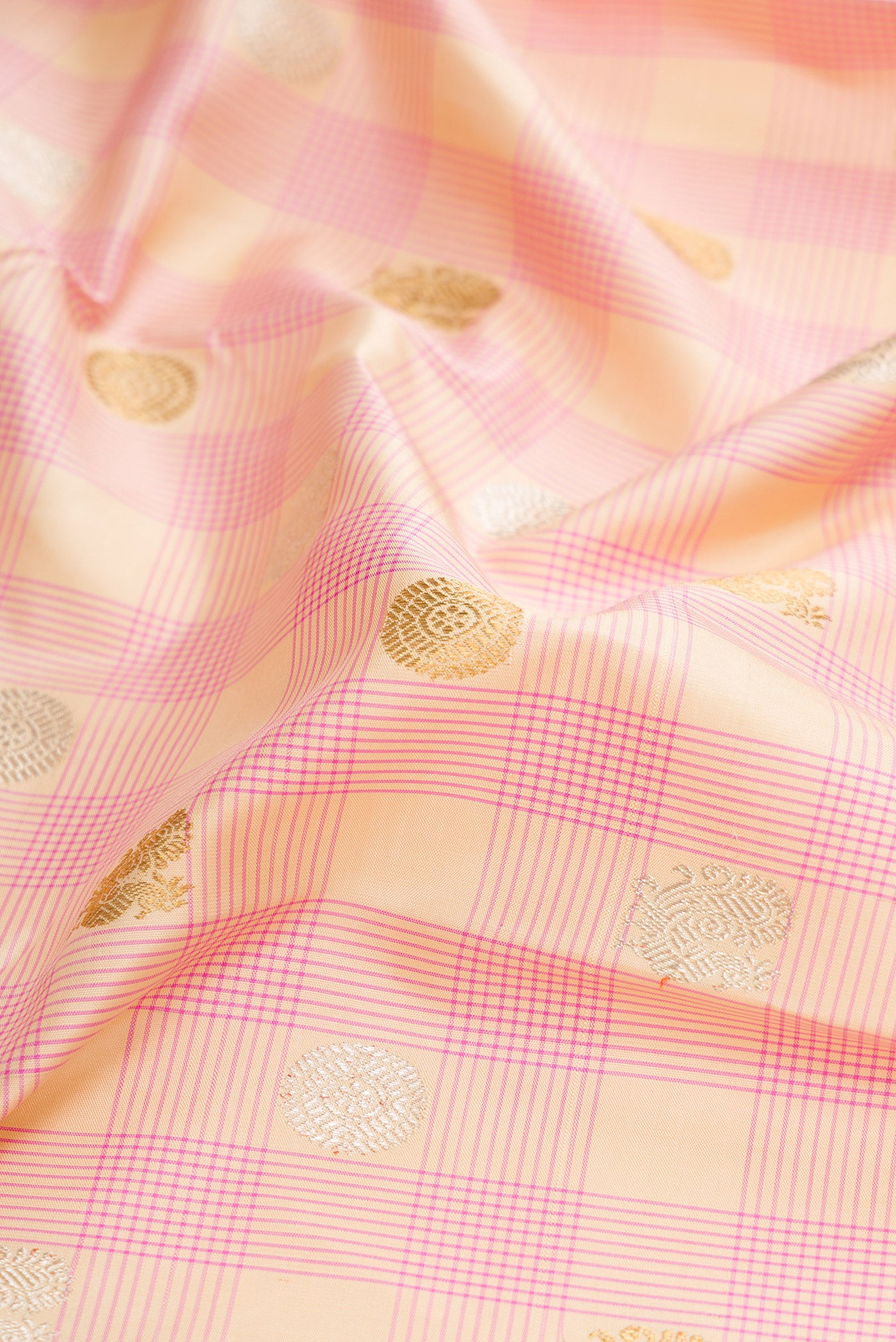 Close up of Pure Silk Pure Zari Sandal Dual Tone Kanchipuram Saree with Checked design on the body and Zari Border.  displaying folds