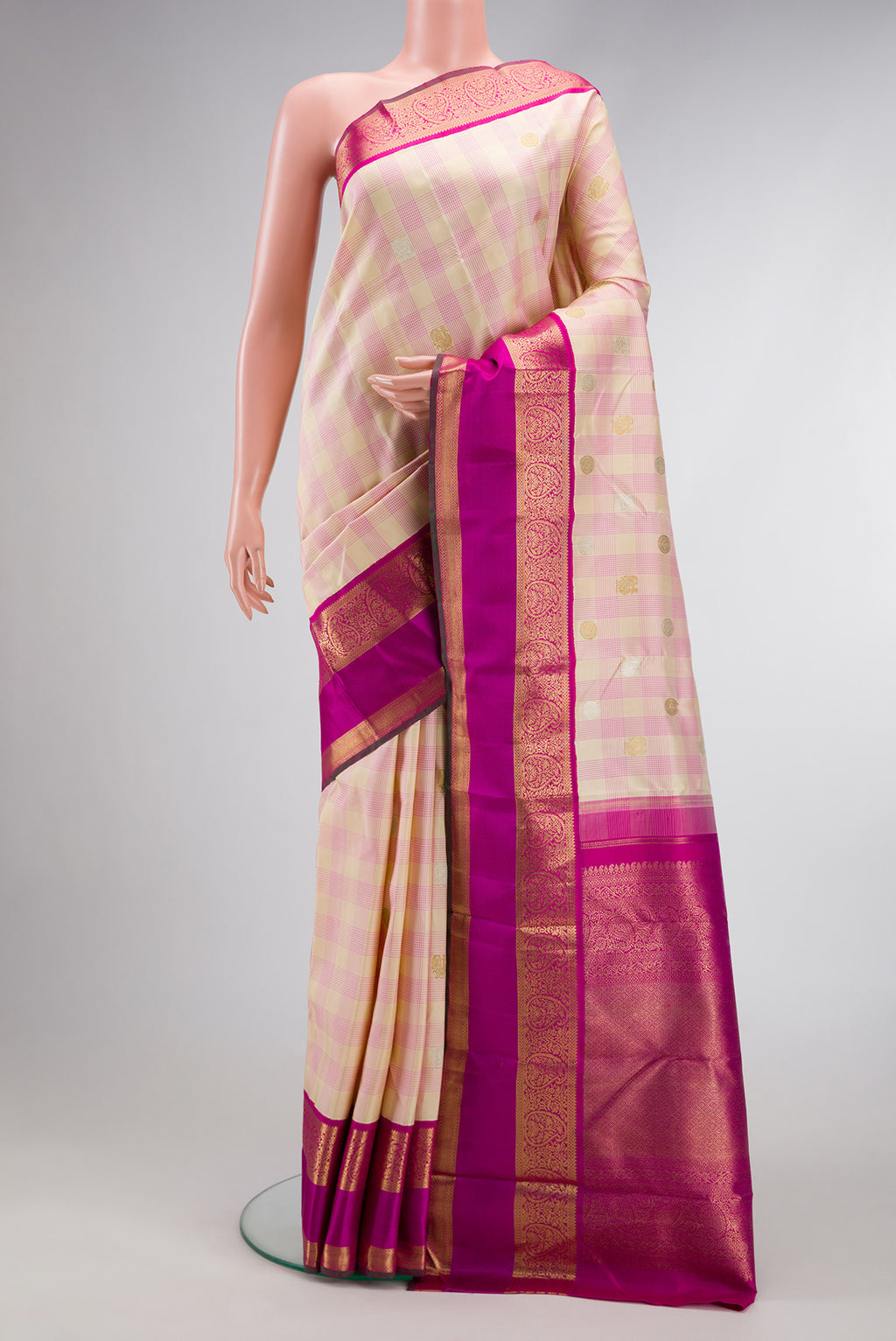 Pure Silk Pure Zari Sandal Dual Tone Kanchipuram Saree with Checked design on the body and Zari Border.  displayed on a mannequin