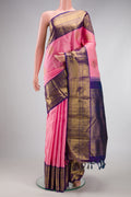 Pure Silk Pure Zari Rose pink Kanjivaram Saree with Zari Butta on the body and Fancy Border.  displayed on a mannequin