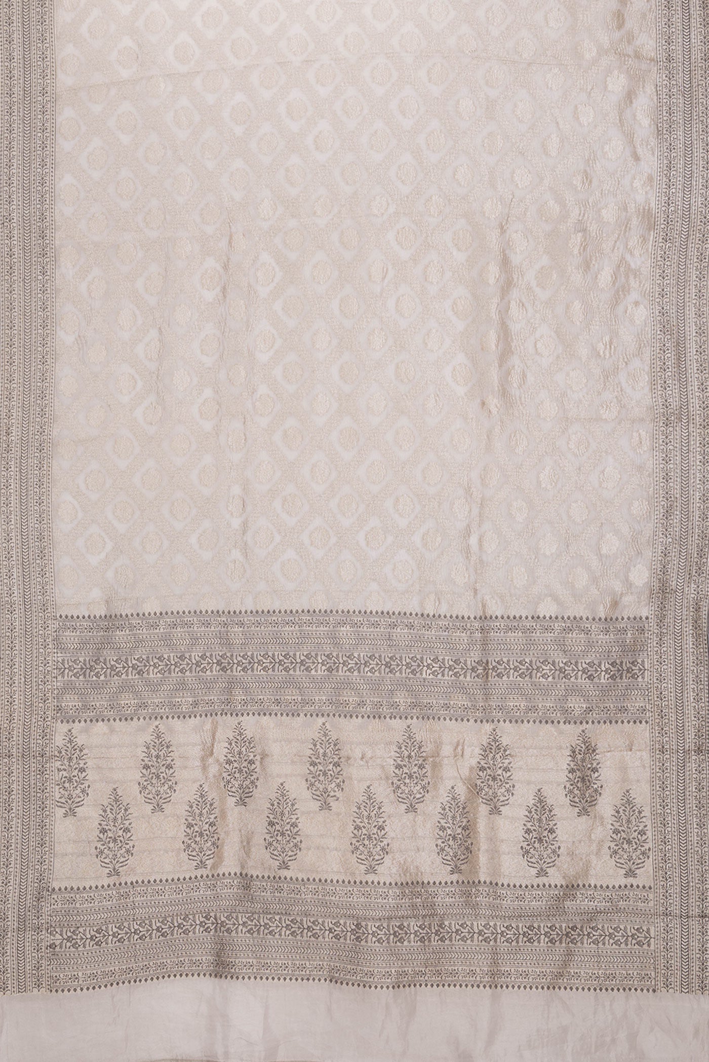 Flat view of Silver Dual Tone Organza Silk Saree with Zari Brocade on the body and Embroidery Border. 