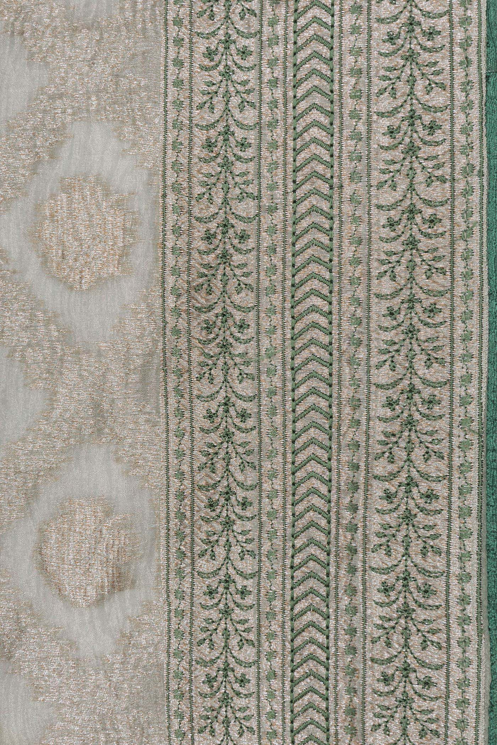 Border image of Pista Green Dual Tone Organza Silk Saree with Zari Brocade on the body and Embroidery Border. 