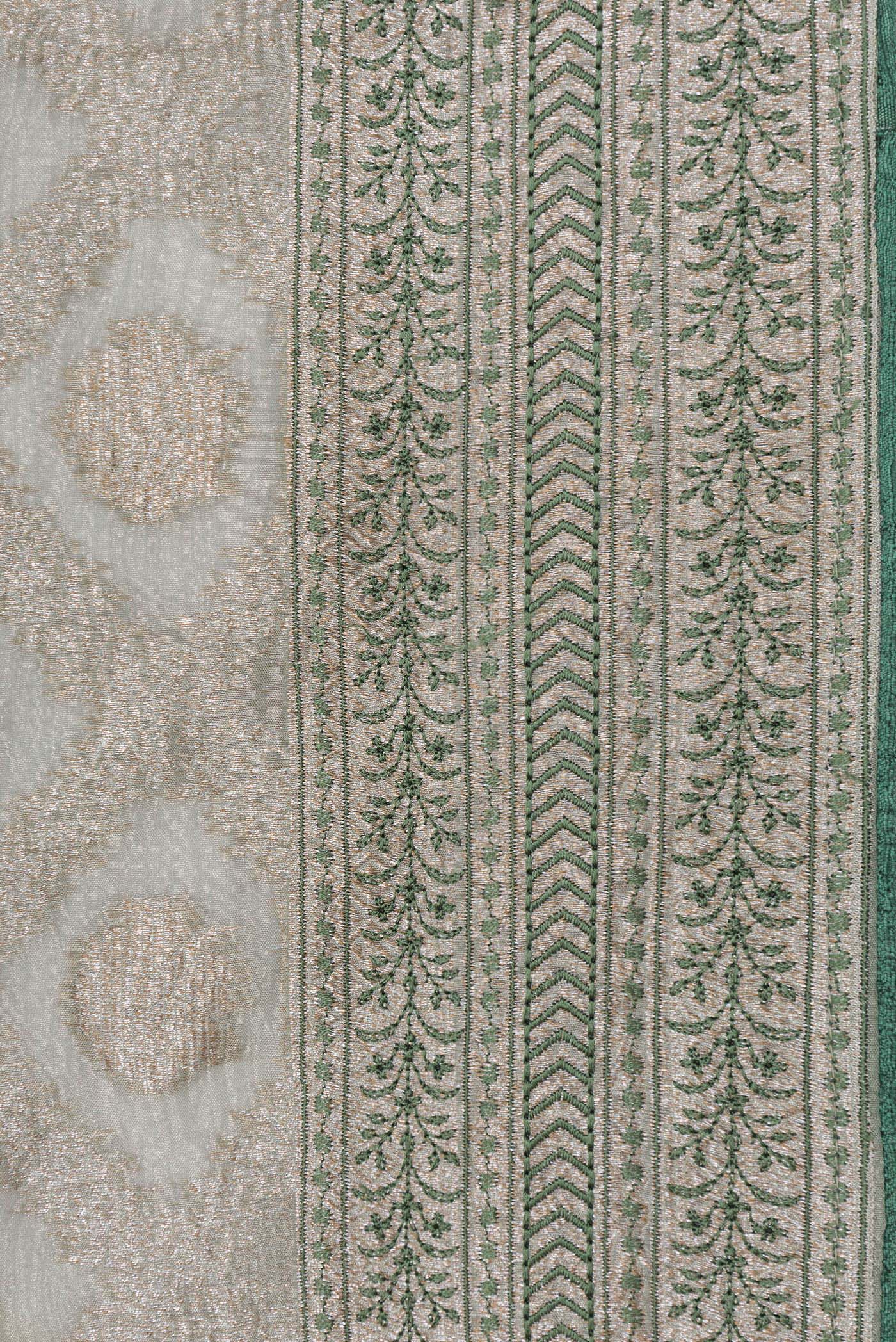 Border image of Pista Green Dual Tone Organza Silk Saree with Zari Brocade on the body and Embroidery Border. 