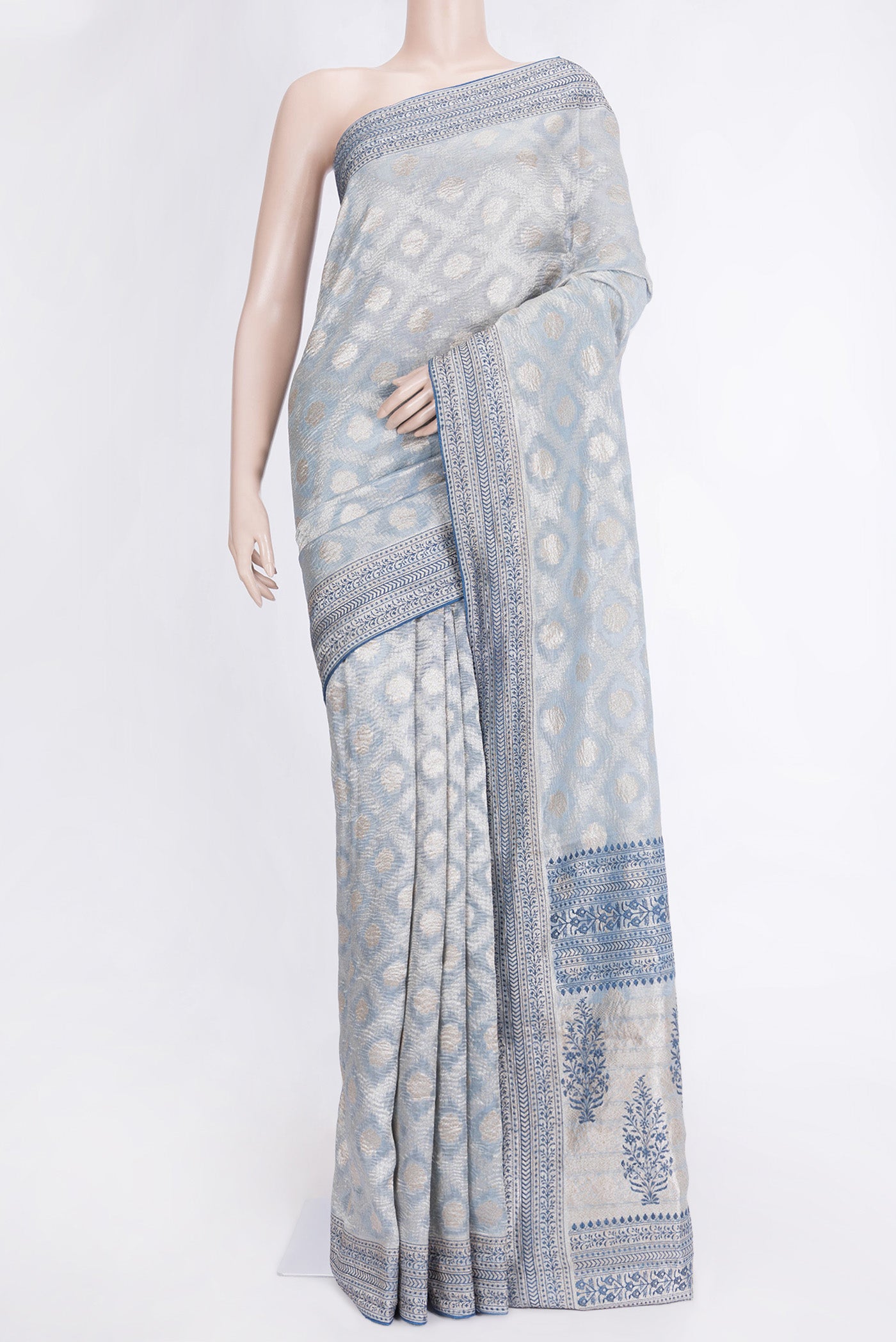 Light Blue Dual Tone Organza Silk Saree with Zari Brocade on the body and Embroidery Border.  displayed on a mannequin