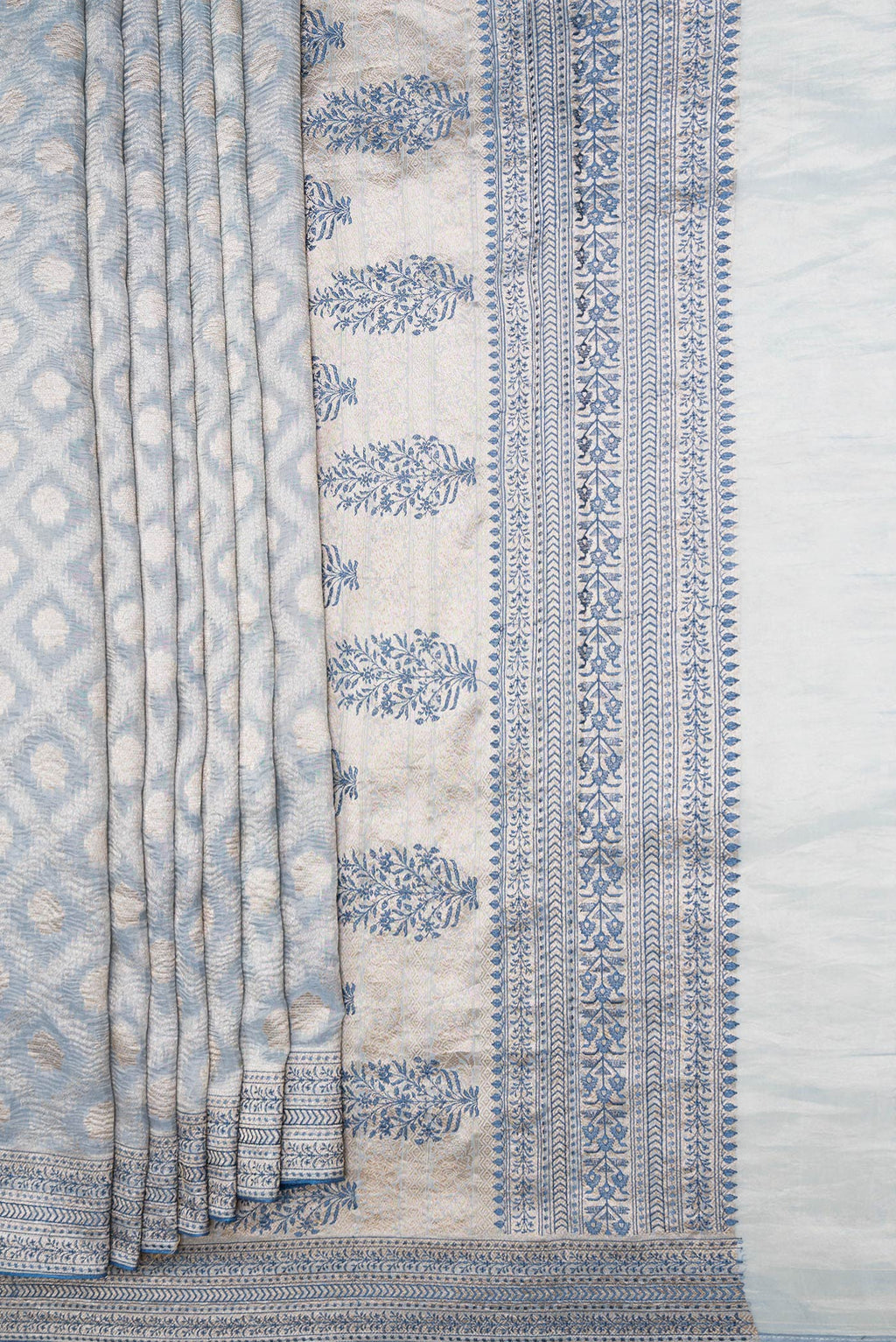 Pleats and pallu of Light Blue Dual Tone Organza Silk Saree with Zari Brocade on the body and Embroidery Border. 