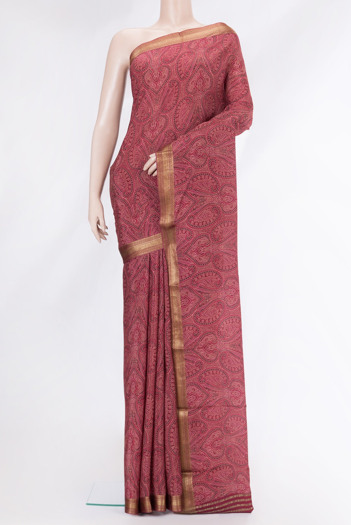 Maroon Dual Tone Mysore Crepe Saree with Printed design on the body and Zari Border.  displayed on a mannequin