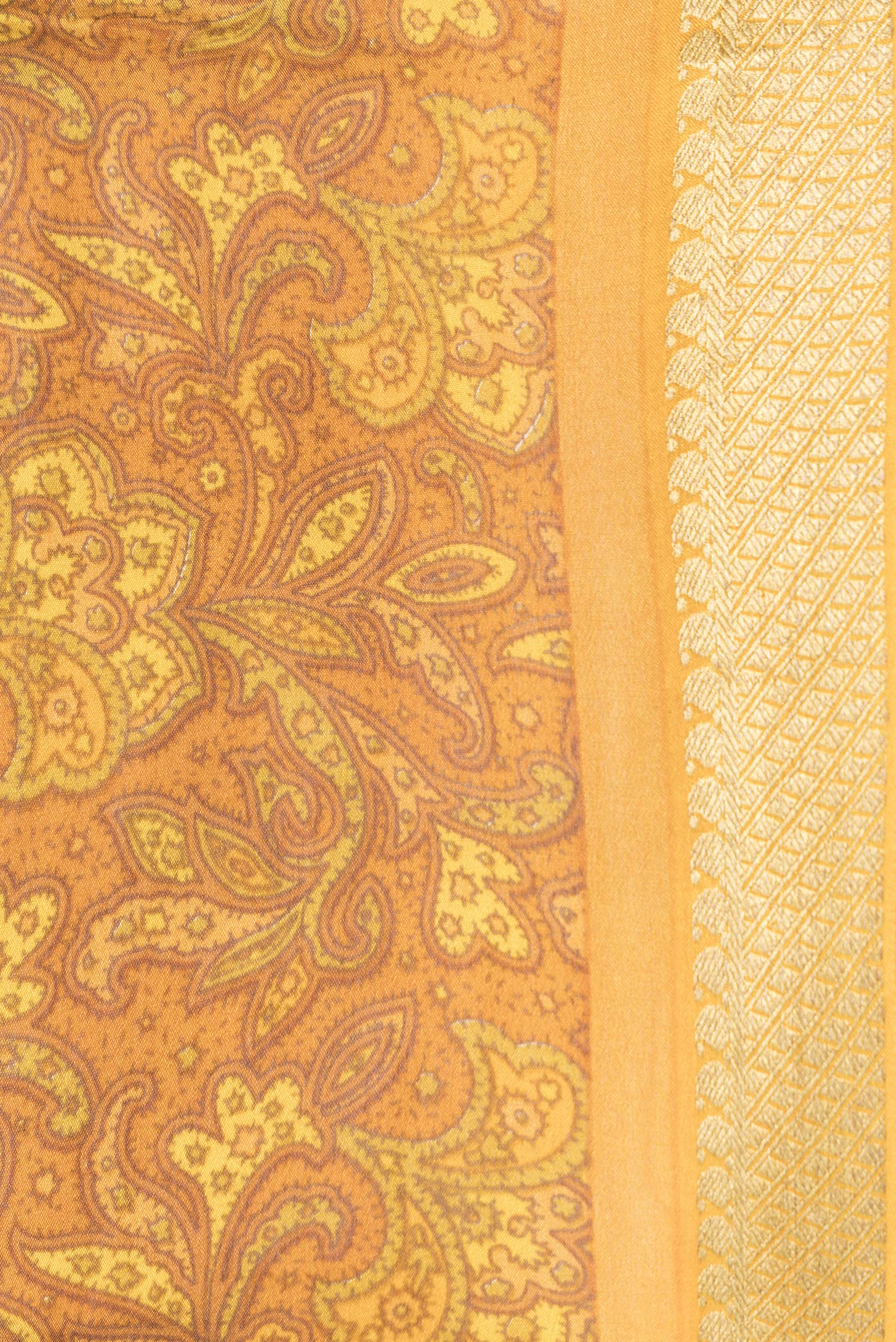 Border image of Mustard Dual Tone Mysore Crepe Saree with Printed design on the body and Zari Border. 
