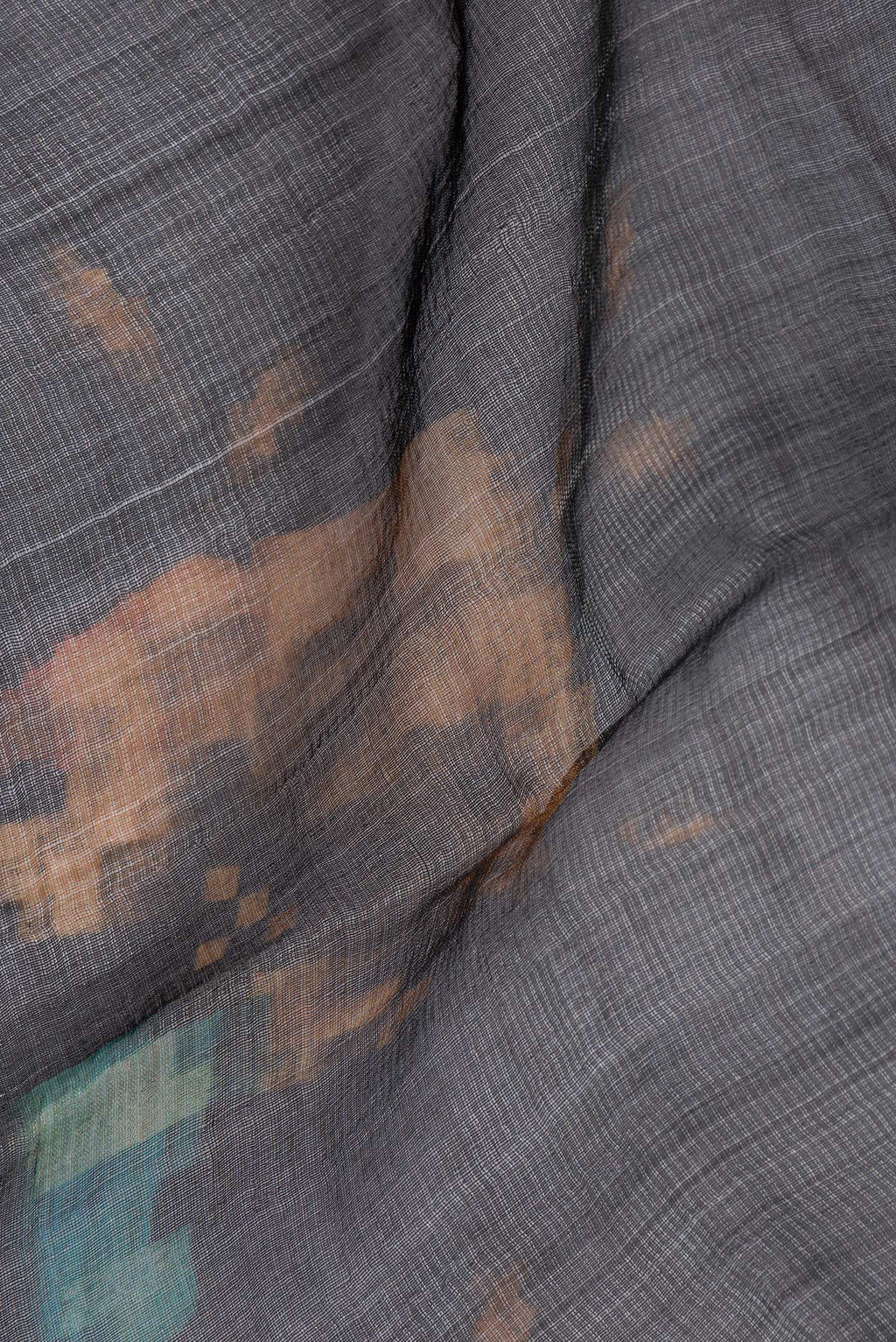 Close up of Black Dual Tone Tussar Silk Saree with Stripes on the body and Plain Border.  displaying folds