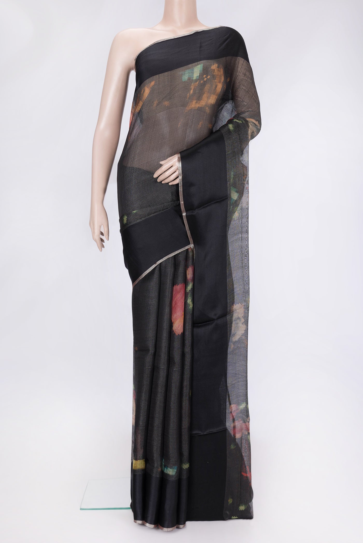 Black Dual Tone Tussar Silk Saree with Stripes on the body and Plain Border.  displayed on a mannequin