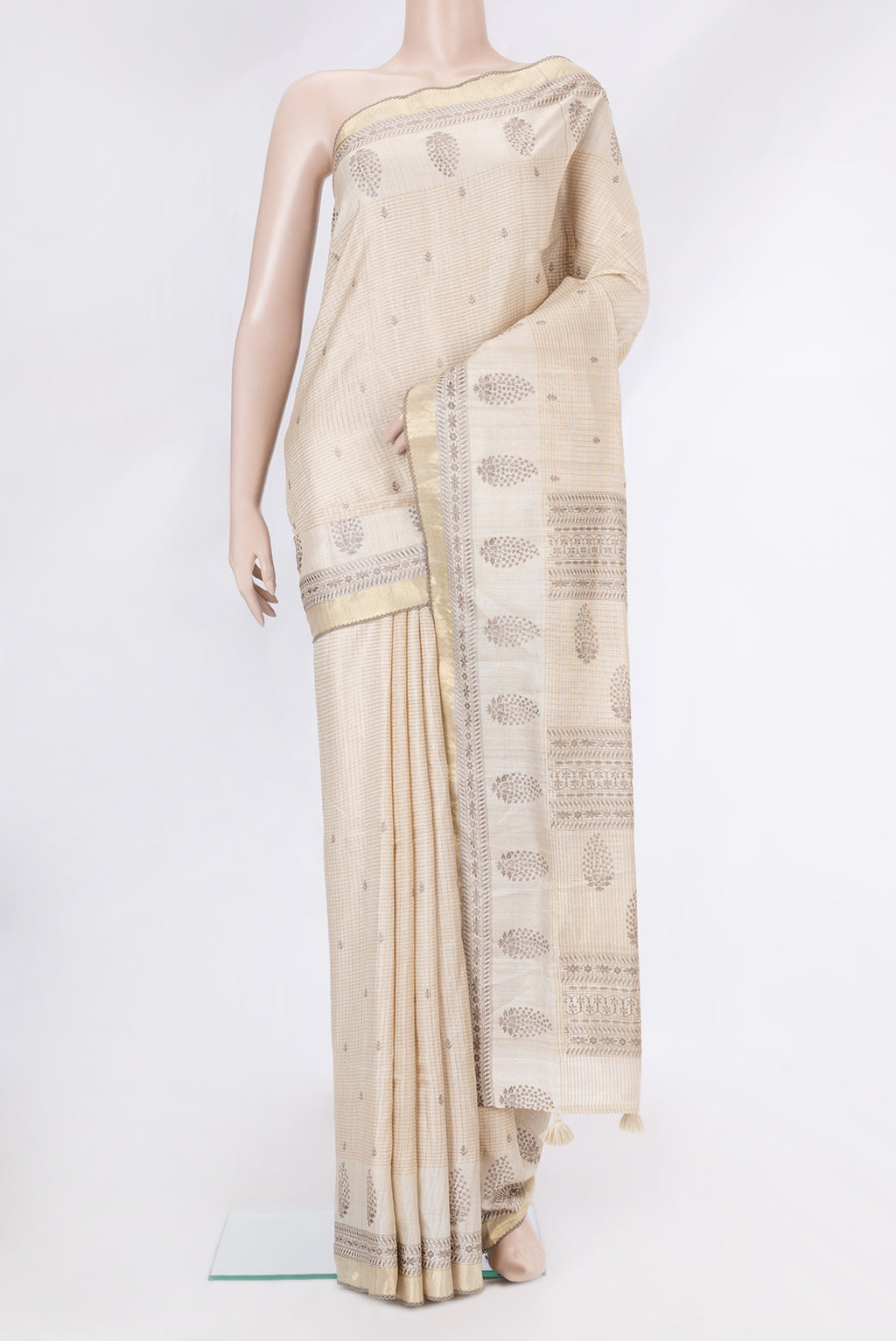 Beige Dual Tone Tussar Silk Saree with Checked design on the body and Embroidery Border.  displayed on a mannequin