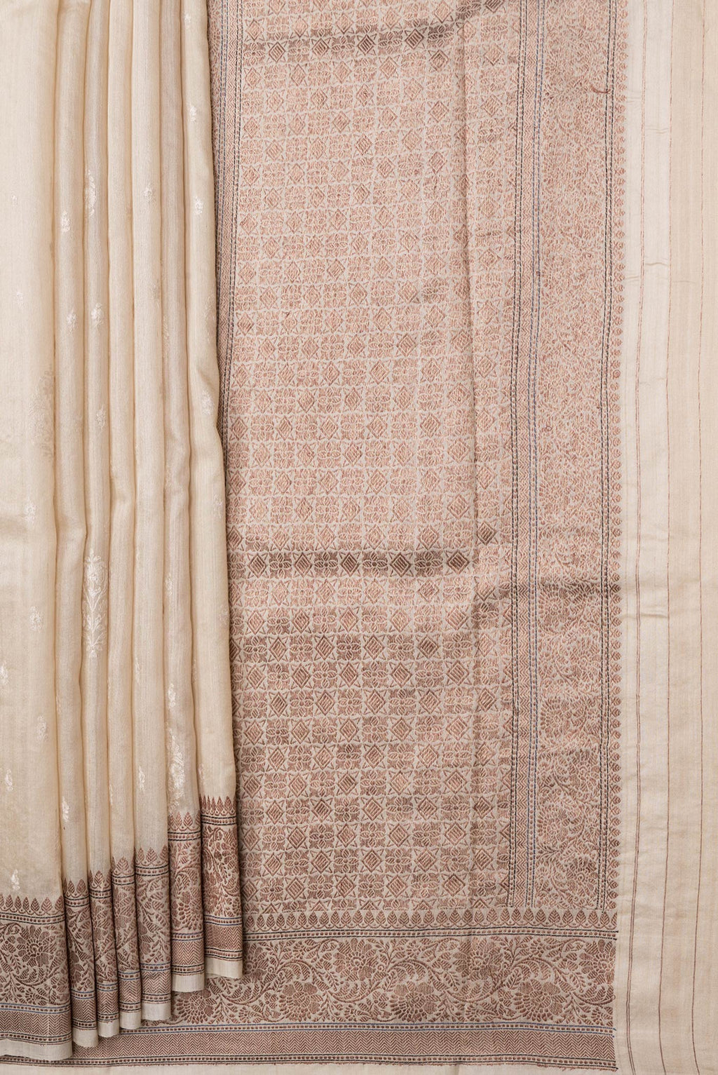 Pleats and pallu of Beige Dual Tone Tussar Silk Saree with Embroidery on the body and Zari Border. 