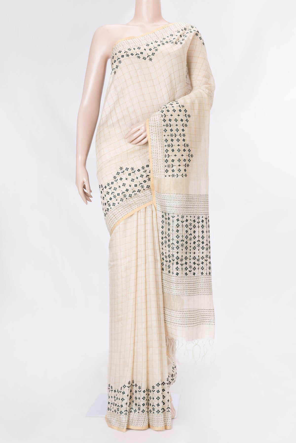 Beige Dual Tone Tussar Saree with Checked design on the body and Embroidery Border displayed on a mannequin
