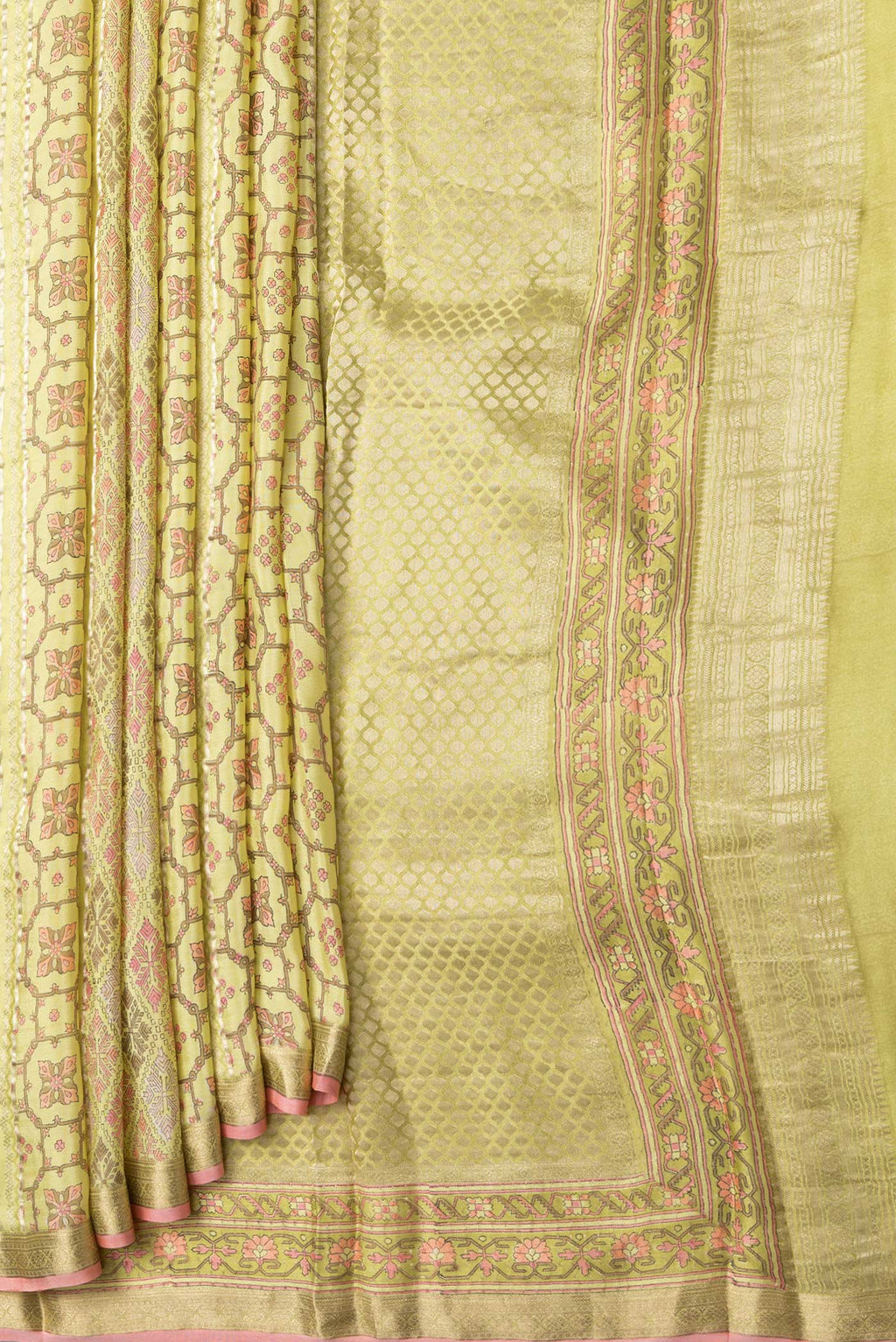 Pleats and pallu of Lemon Yellow Dual Tone Mysore Crepe Saree with Printed design on the body and Zari Border. 