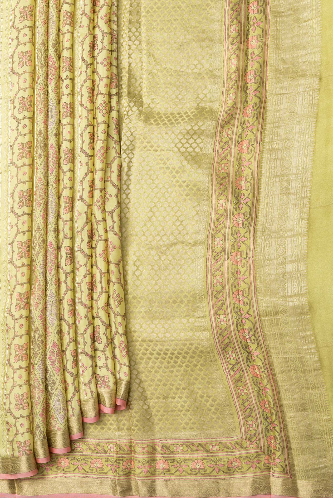 Pleats and pallu of Lemon Yellow Dual Tone Mysore Crepe Saree with Printed design on the body and Zari Border. 