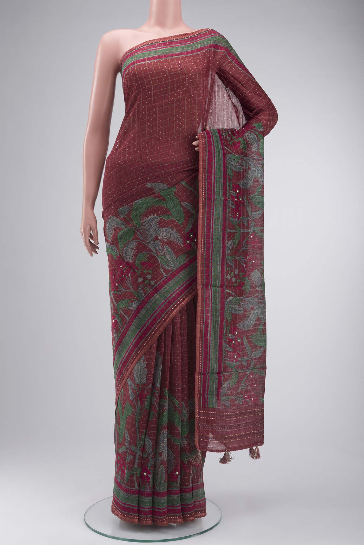Maroon Bhagalpuri Tussar Silk Saree with Printed design on the body and Embroidery Border displayed on a mannequin