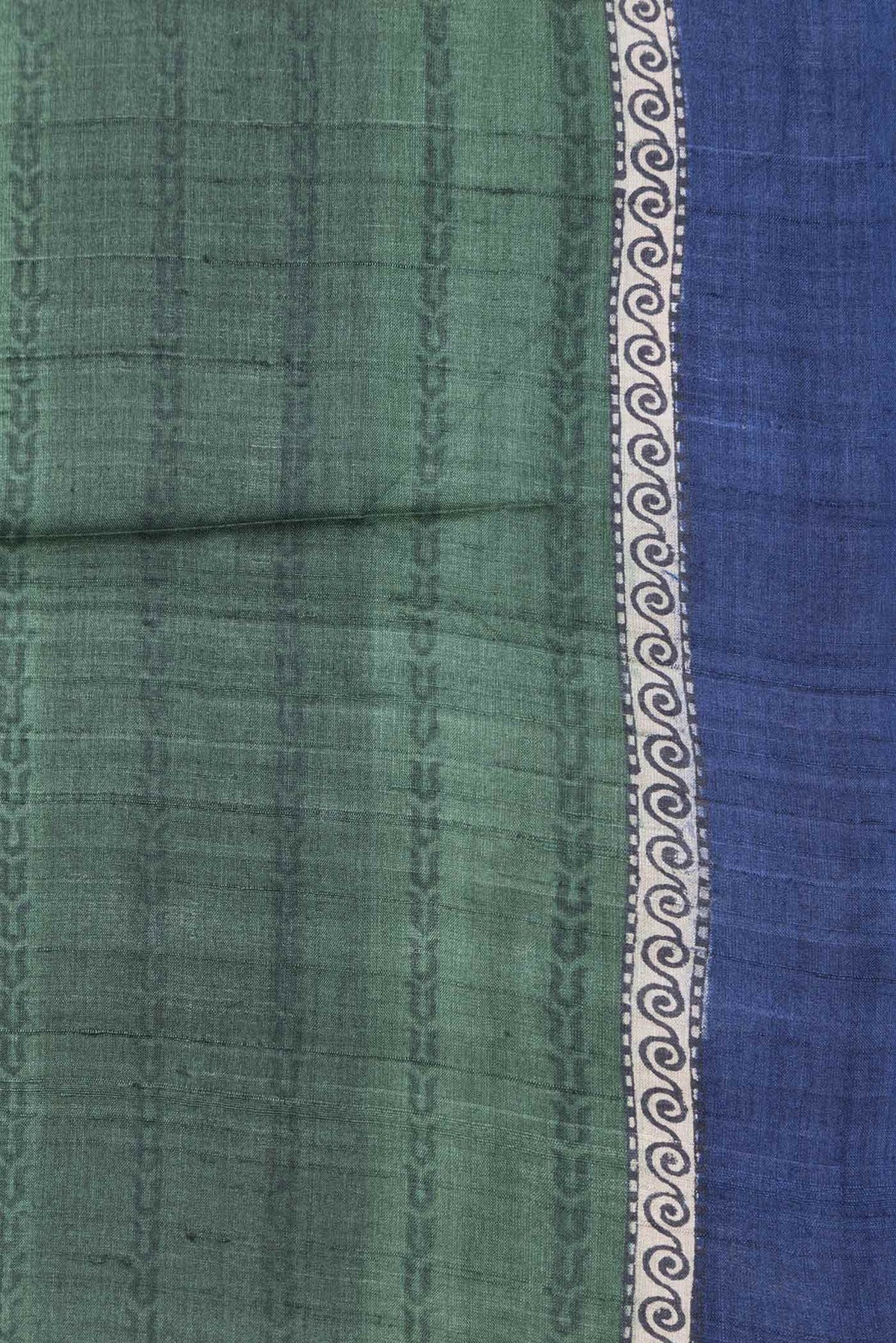 Border image of Green Dual Tone Tussar Silk SareePrinted design on the body and Plain Border