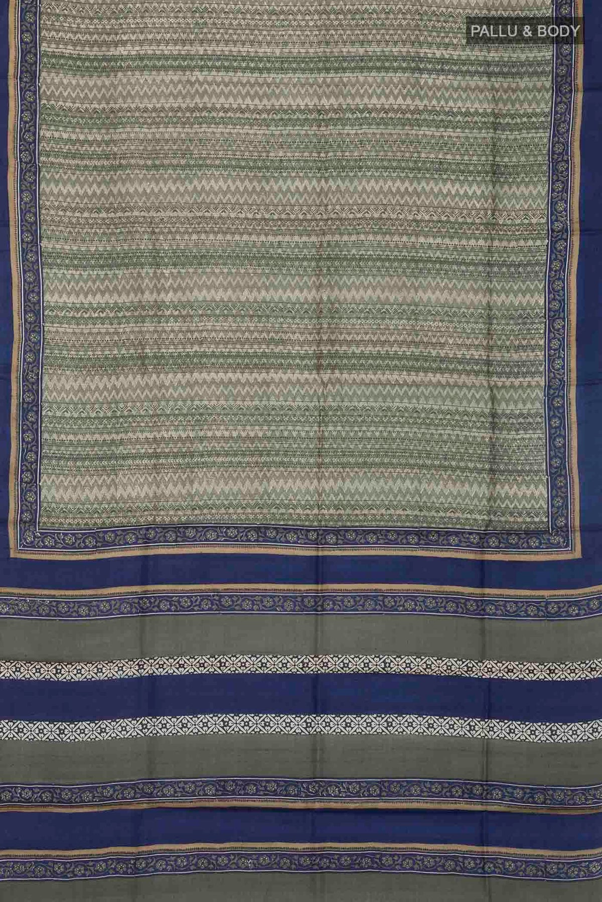 Flat view of Green Tussar Silk Saree with Printed design on the body and Plain Border