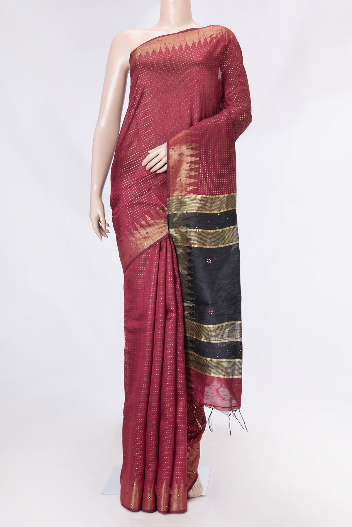 Maroon Dual Tone Tussar Saree with Stripes on the body and Embroidery Border displayed on a mannequin
