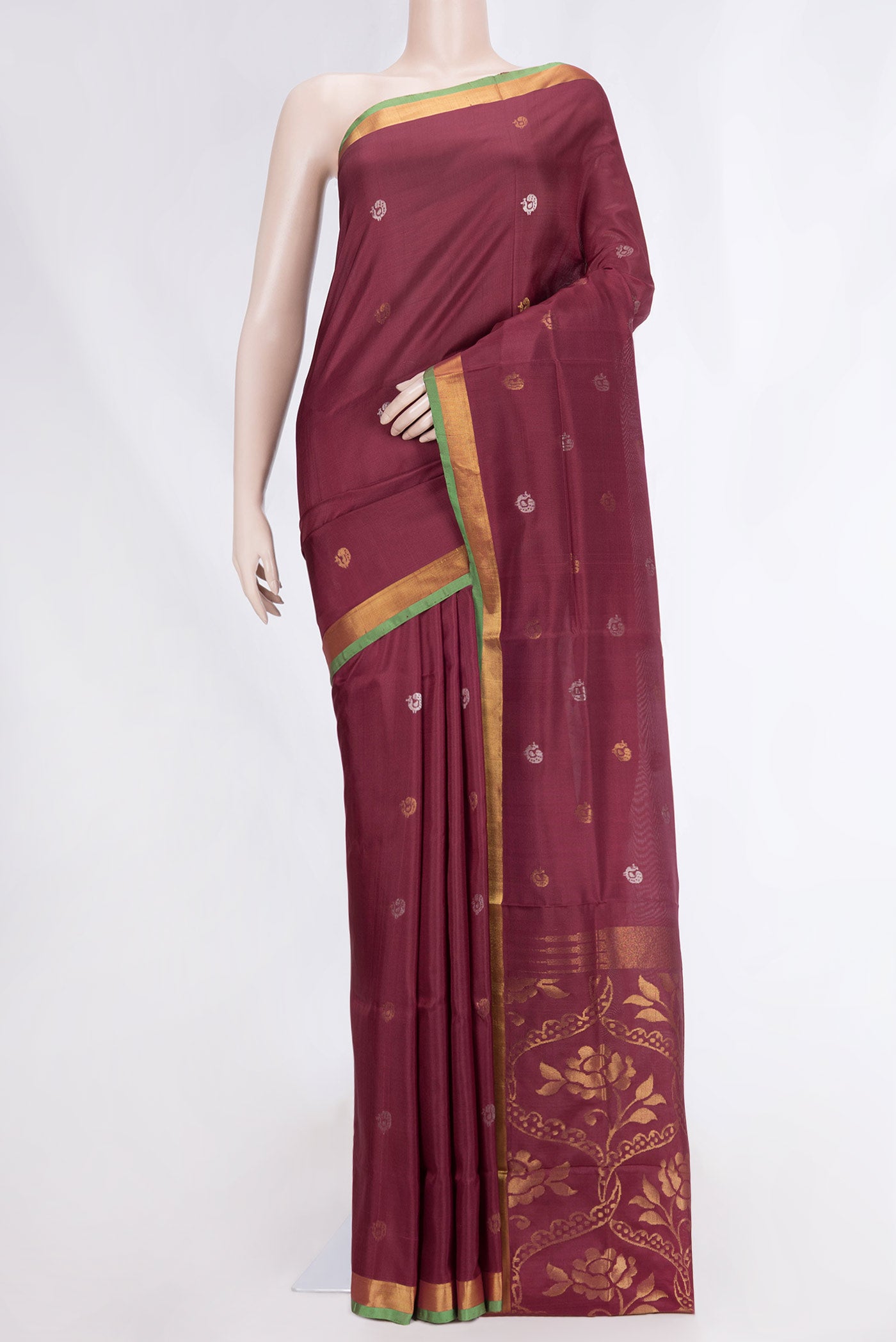 Maroon Dual Tone Uppada Silk Saree with Zari And Thread Butta on the body and Zari Border displayed on a mannequin