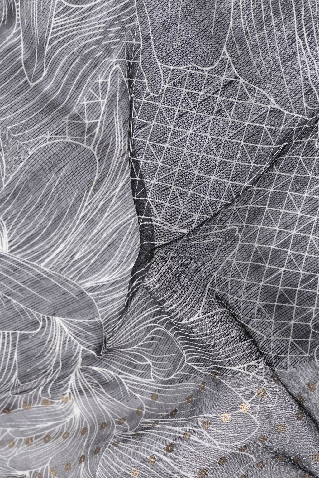 Close up of Black Dual Tone Tussar Silk Saree with Printed design on the body and Without Border.  displaying folds