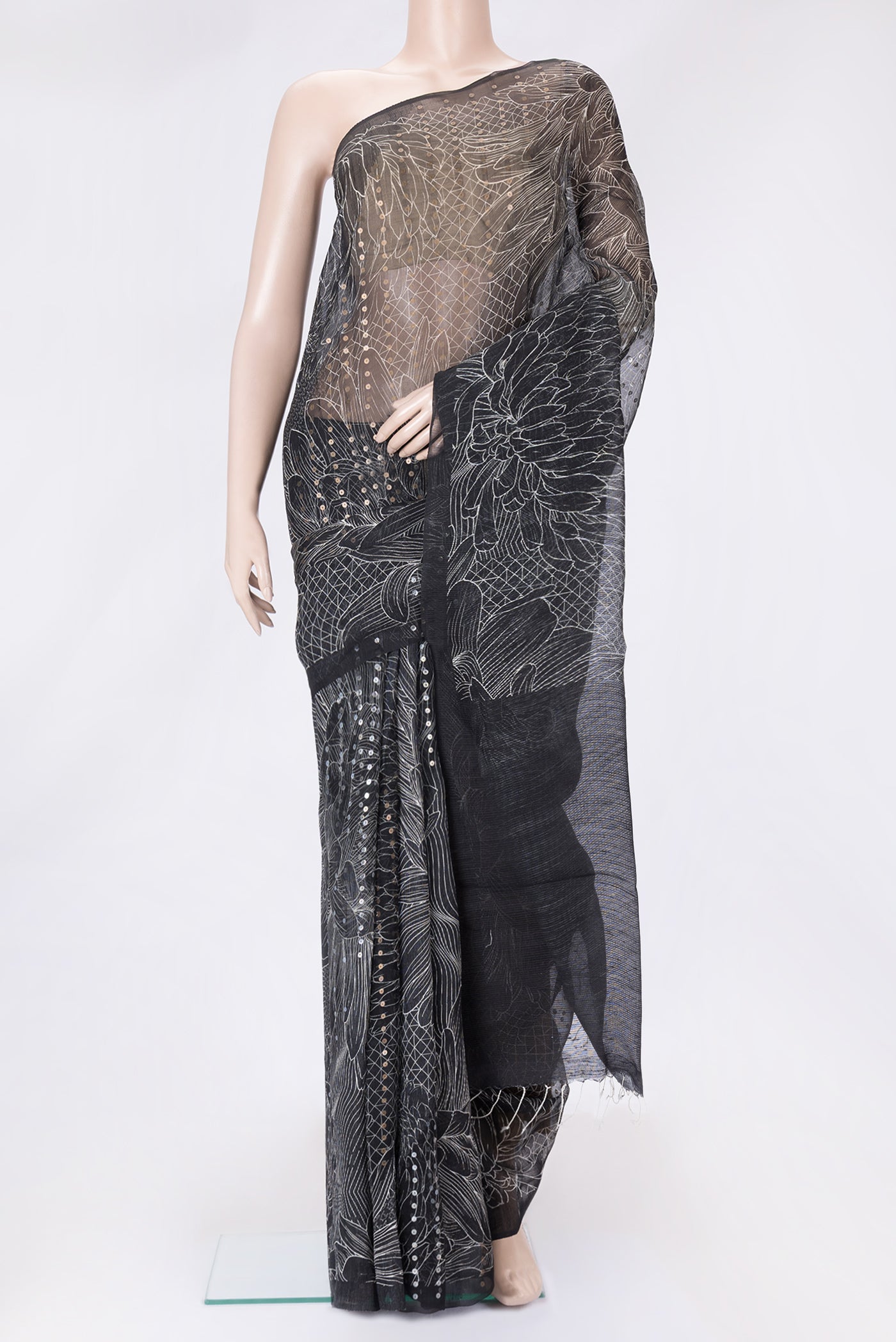 Black Dual Tone Tussar Silk Saree with Printed design on the body and Without Border.  displayed on a mannequin