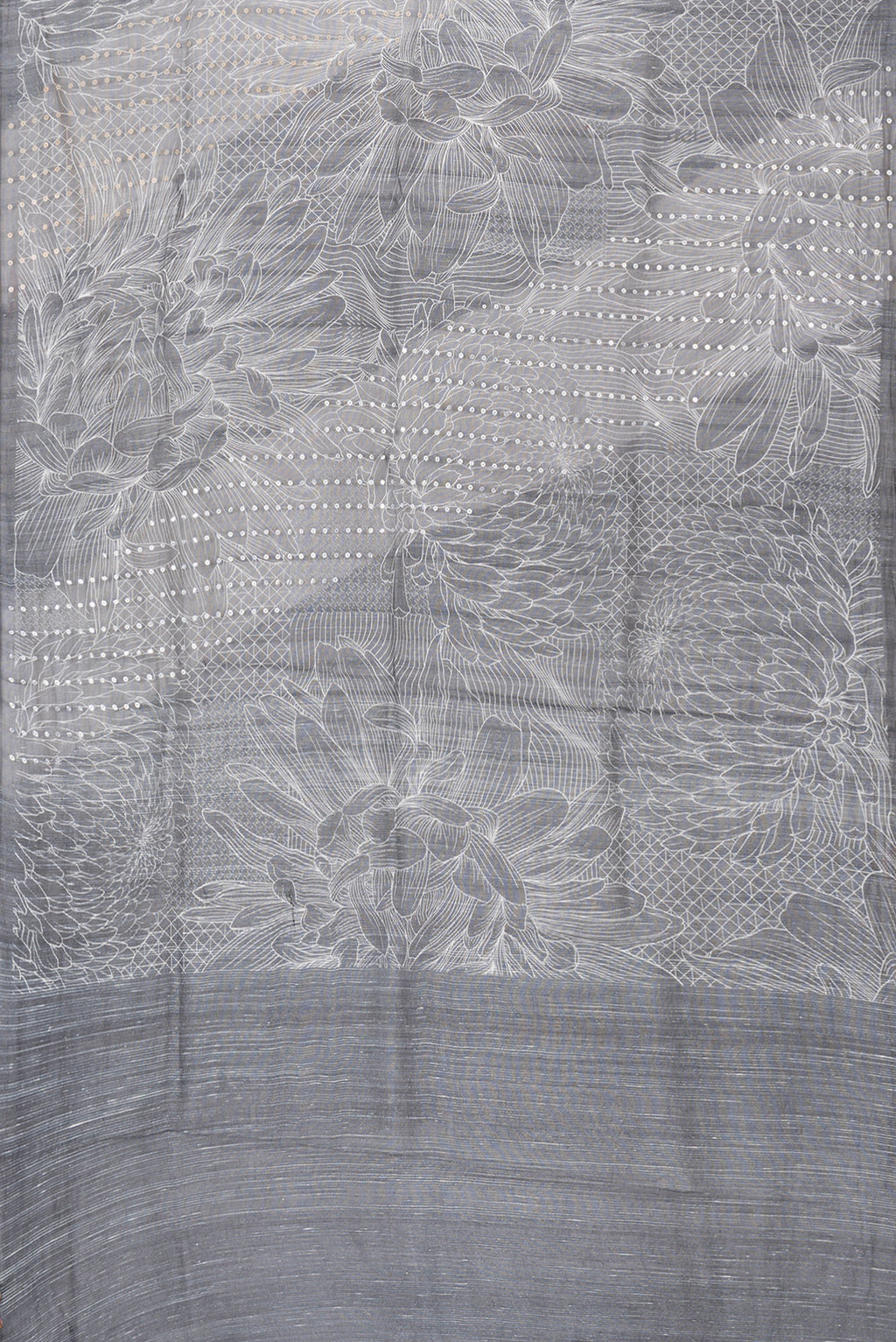 Flat view of Black Dual Tone Tussar Silk Saree with Printed design on the body and Without Border. 