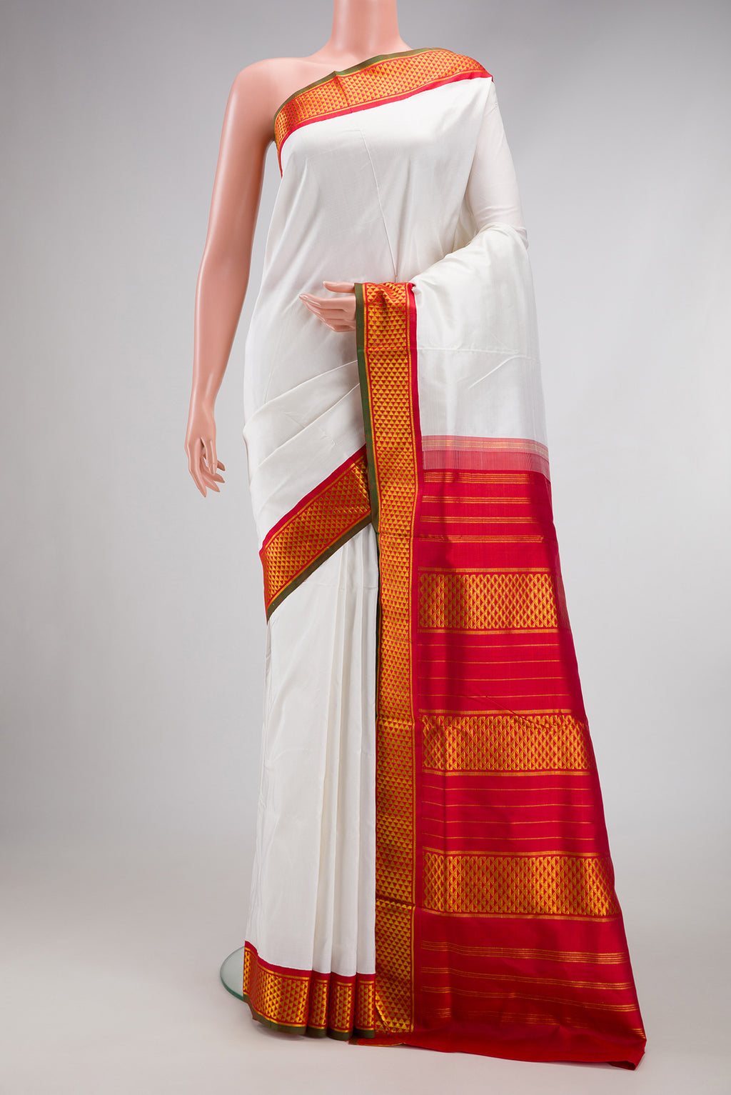 White Kanjivaram Silk Nine Yards Saree with Plain Body and Zari Border.  displayed on a mannequin